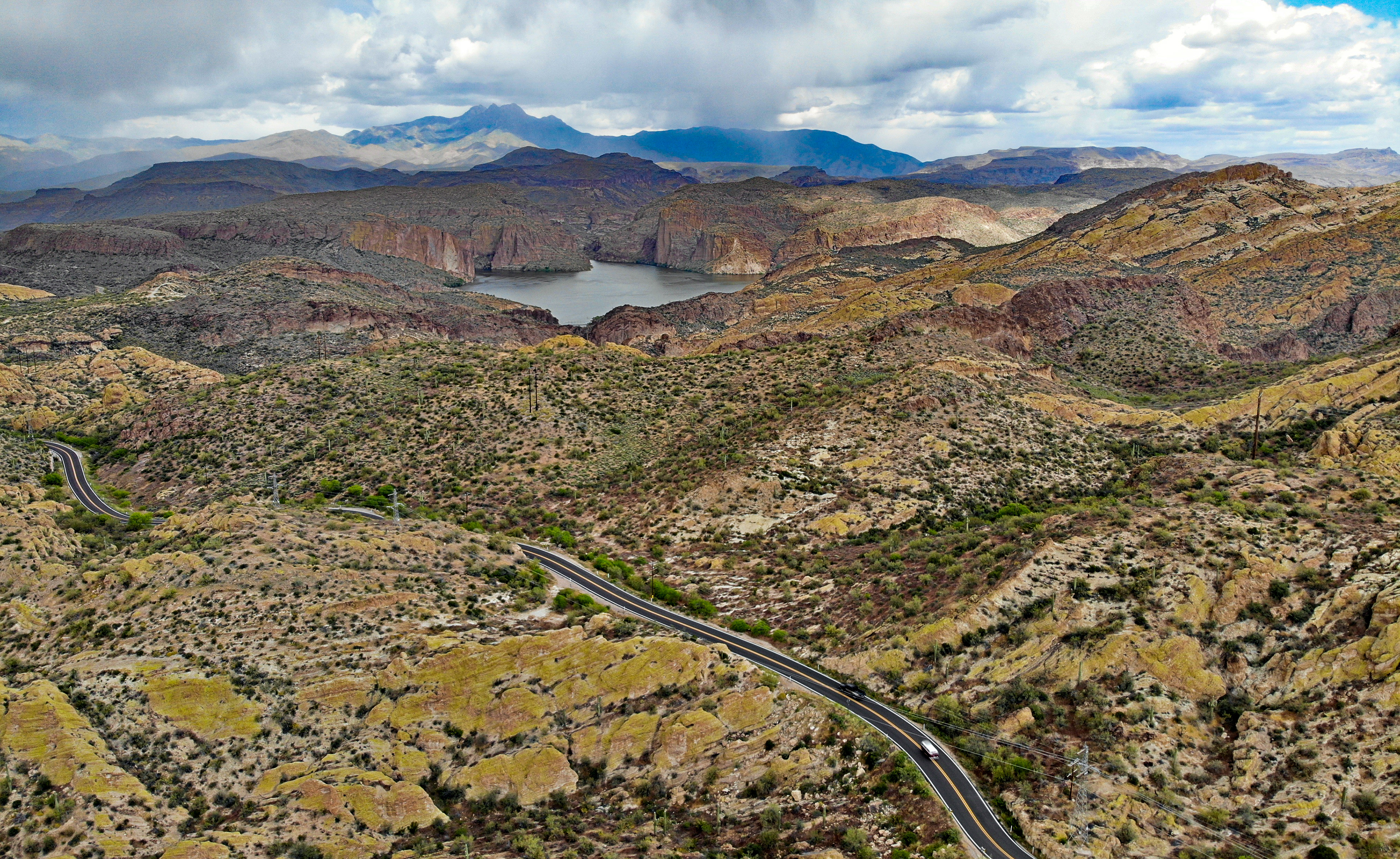 Aerial: Canyon Lake with Four Peaks in background