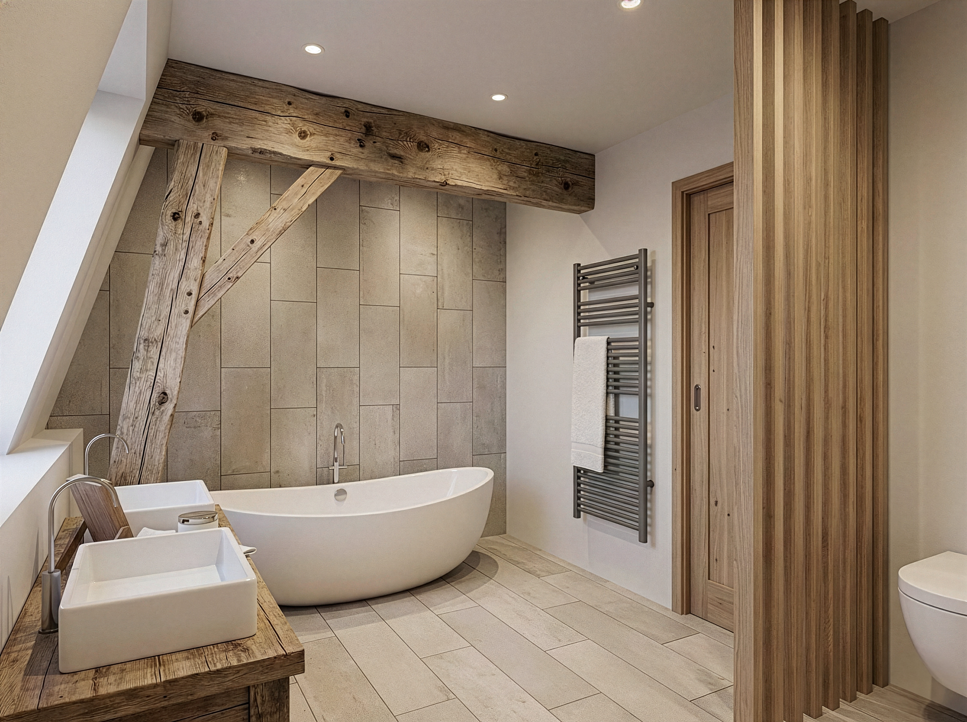 Salle de bain sous combles avec baignoire îlot, double vasque et vélux