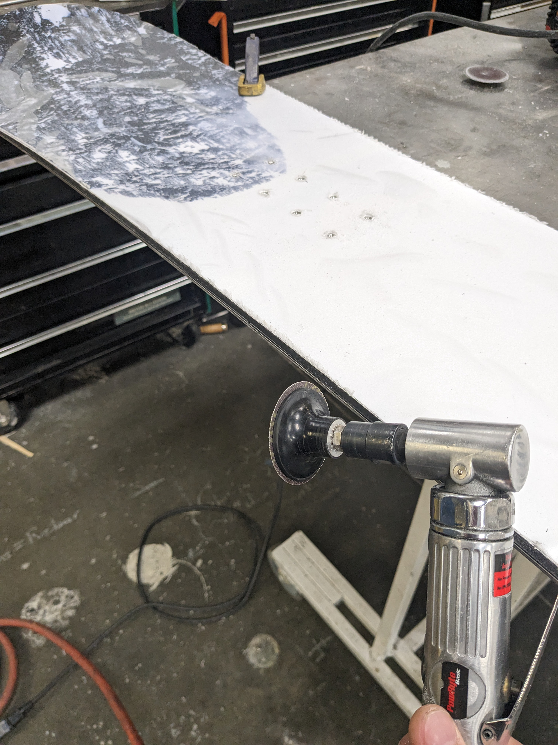 Rounding the topsheet edges, this will prevent delaminations and looks nice.