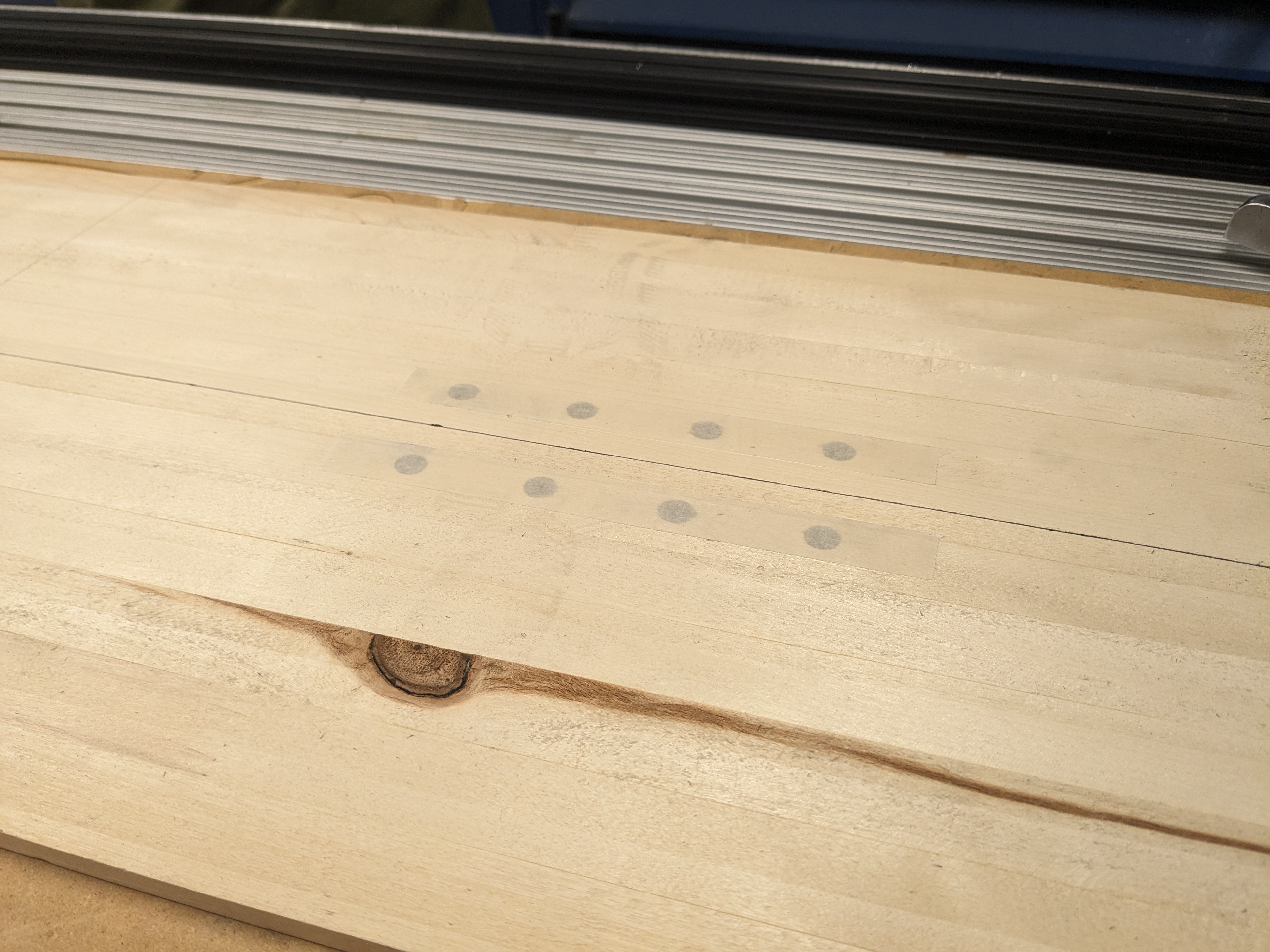 Covering the holes for the threaded inserts.