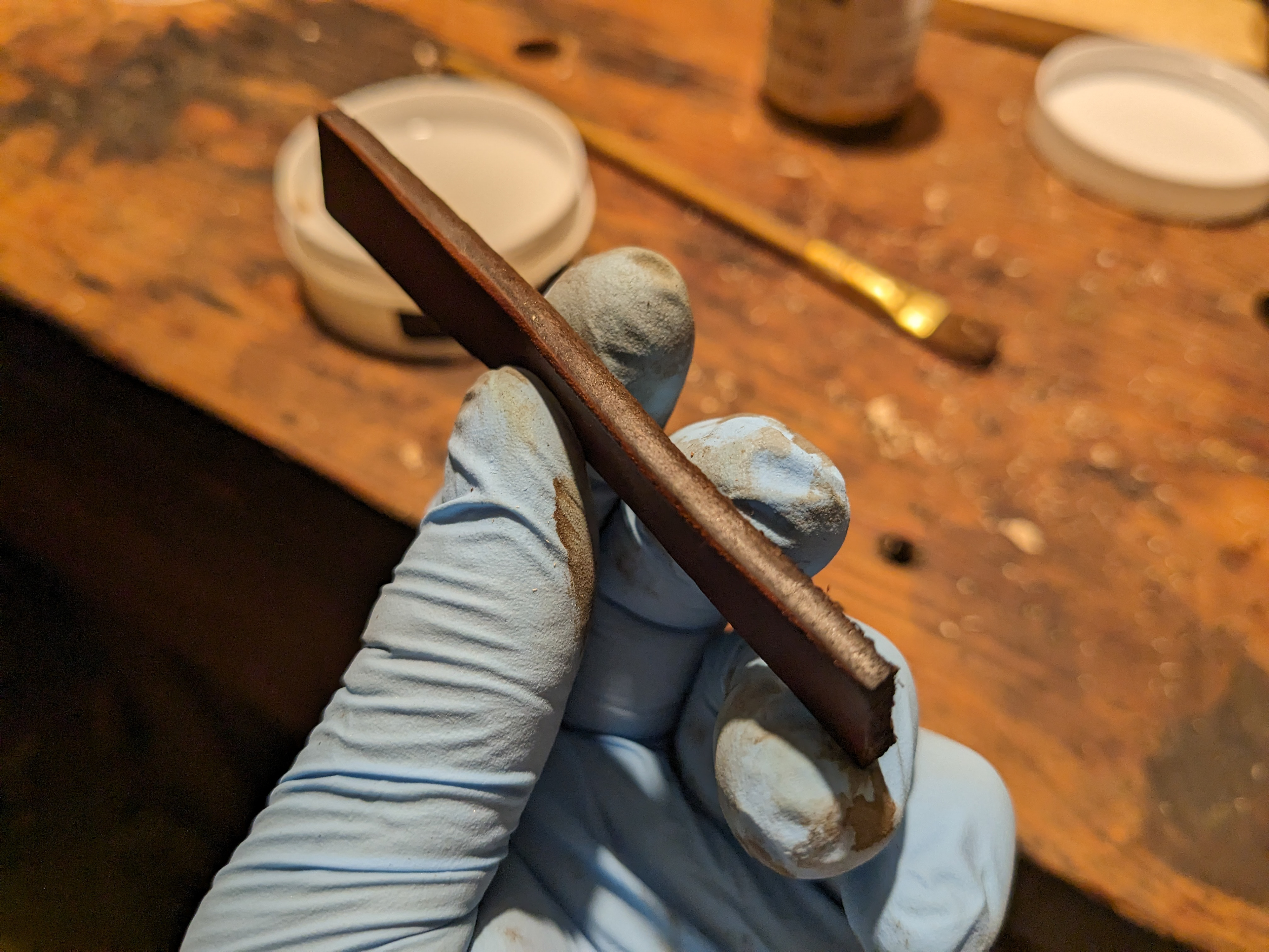 Burnishing the edge of the loop.