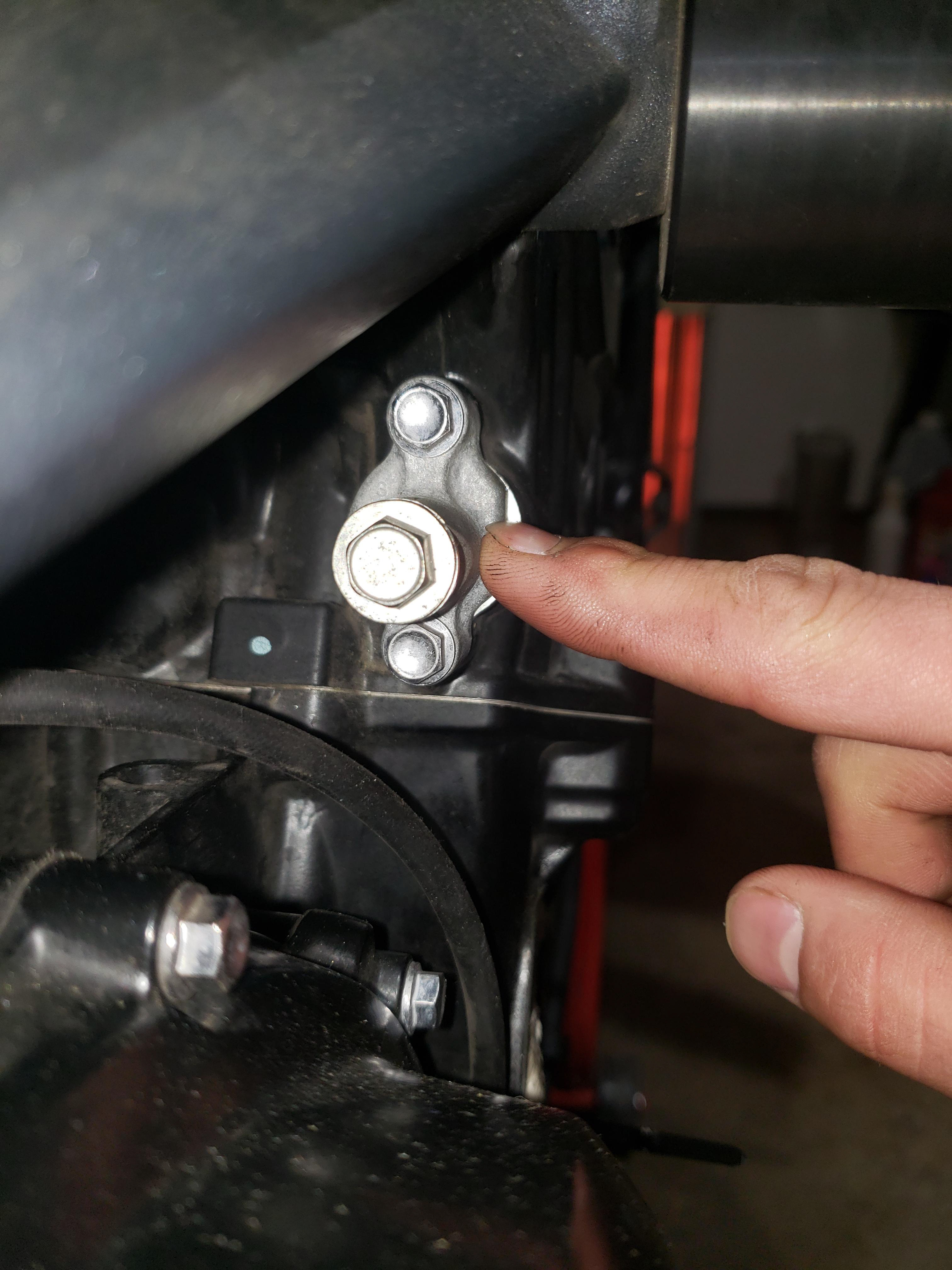 Timing chain tensioner removal.