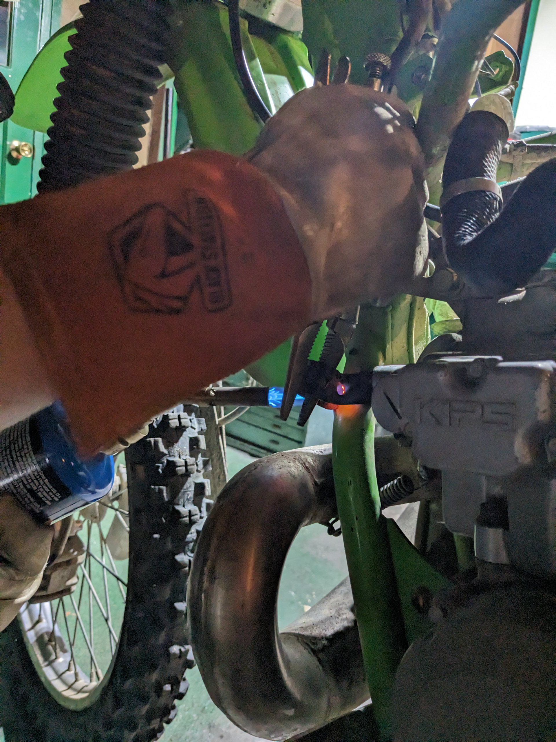 Bending back the radiator mount.