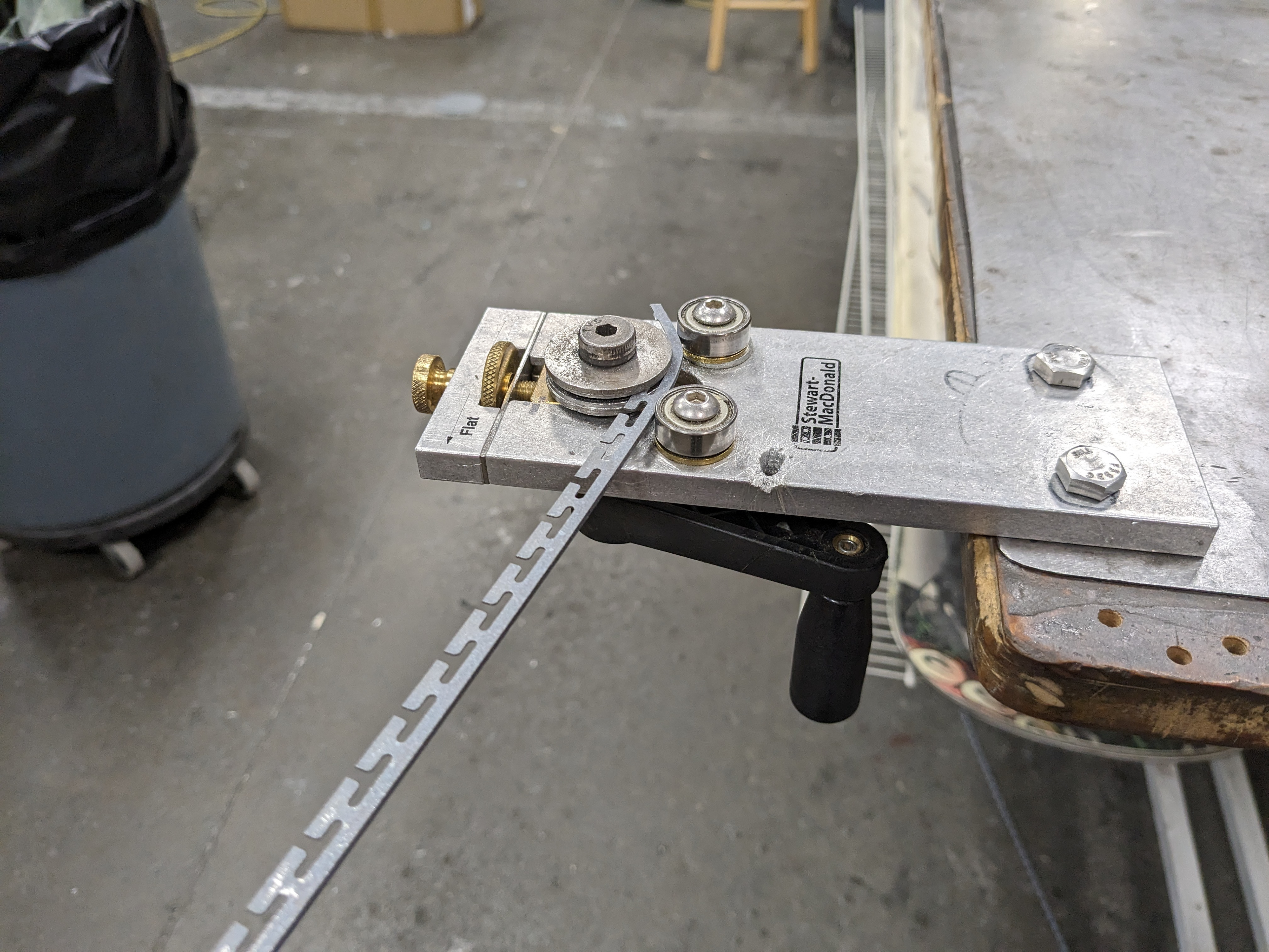 Getting pre-bend using a modified guitar building tool.