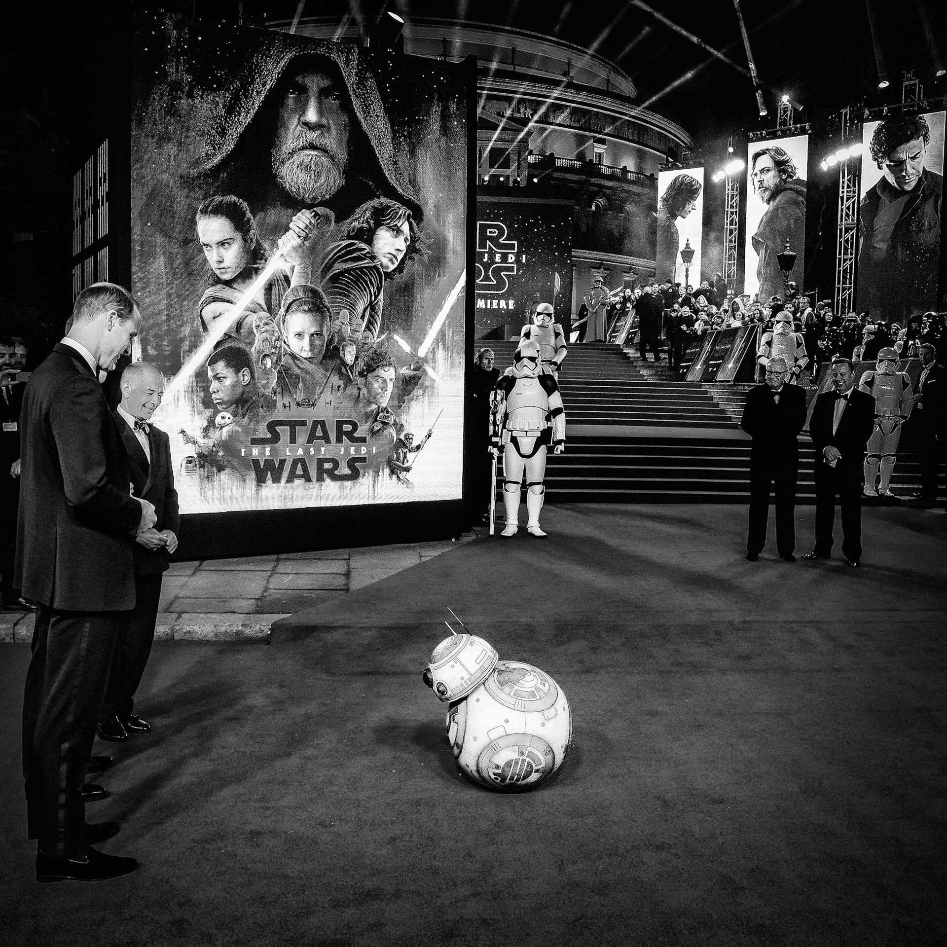 BB8 takes a bow before Prince William and Prince Harry attends the European Premiere of Star Wars - The Last Jedi at The Royal Albert Hall on Tuesday December 12, 2017. Pictured: Prince William, Duke of Cambridge ,Prince Henry of Wales.