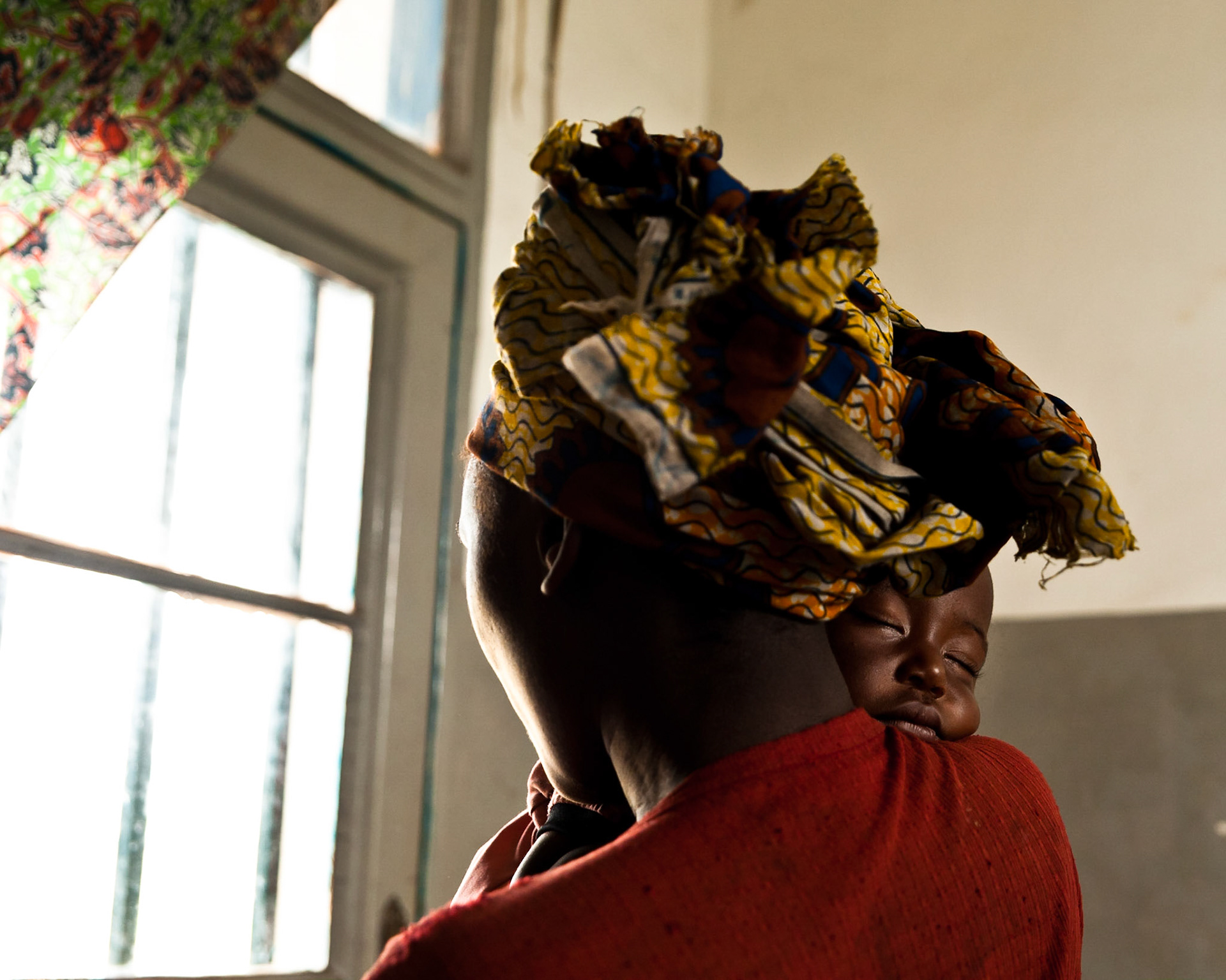 A rape victim and her baby at the Centre de Sante de Kanyaruchinya . Picture by Julie Edwards/CARE International