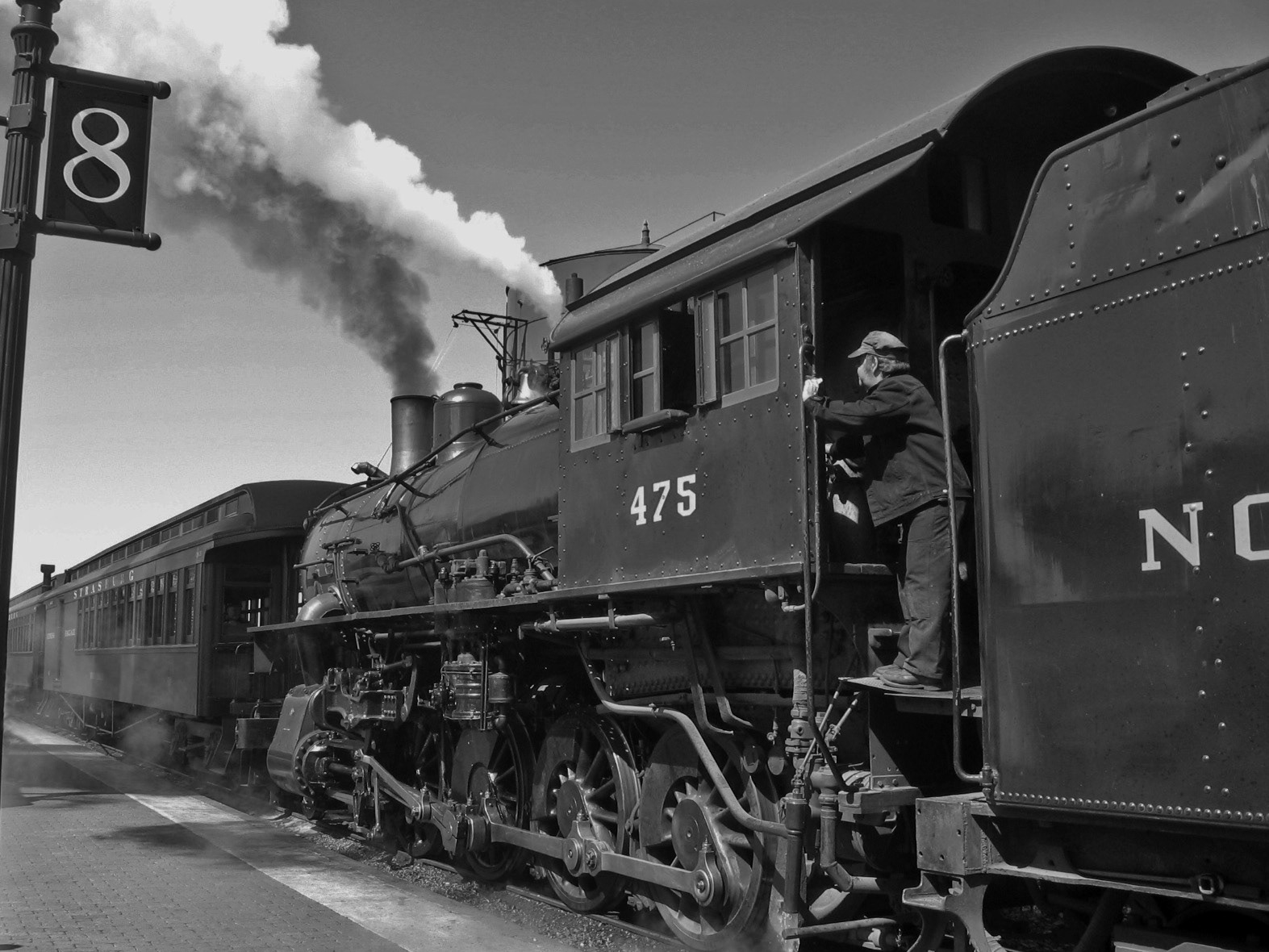 Steam engine number 8 stop with conductor
