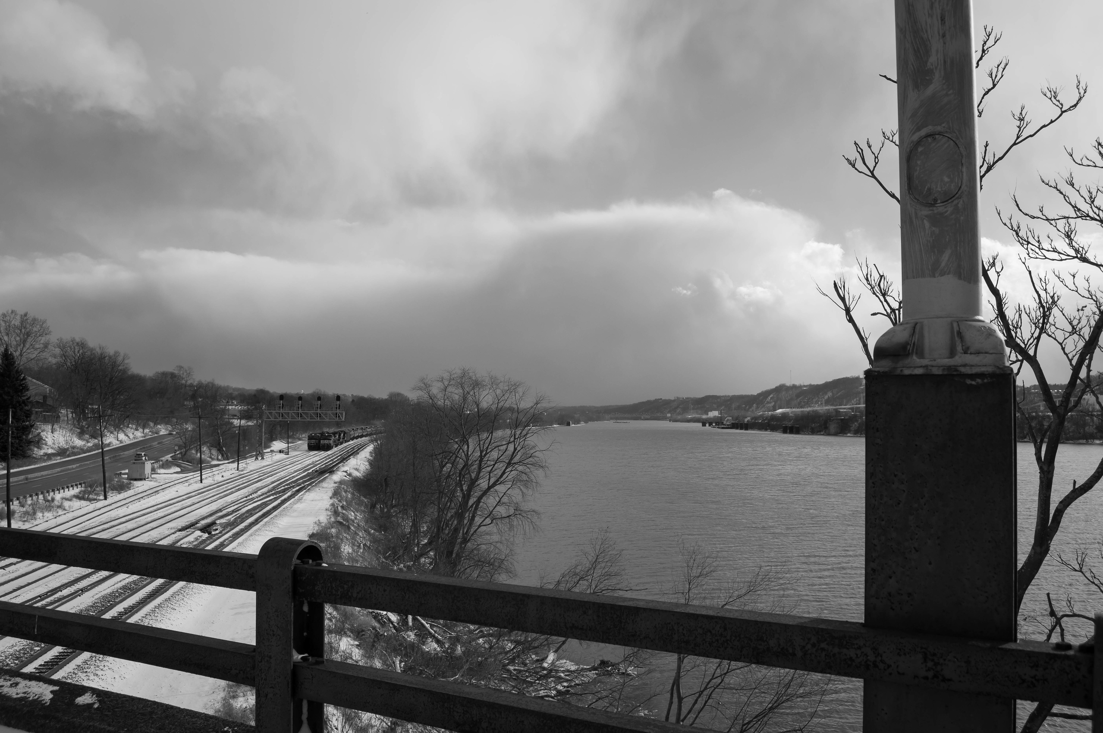 Clouds over Ohio River and railroad tracks