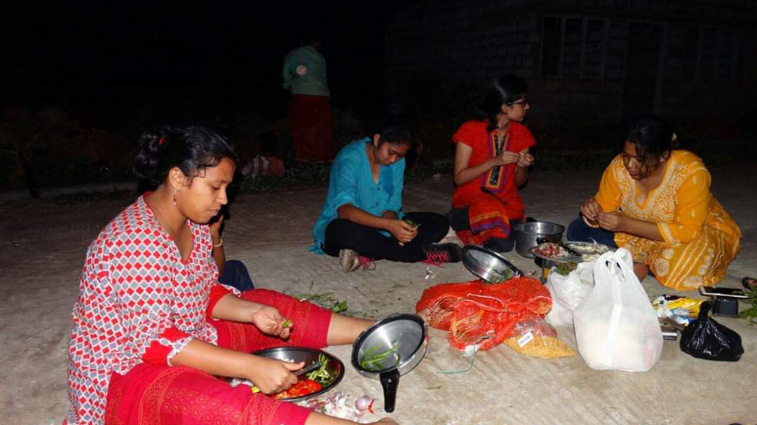 Cooking under the stars with our gracious hosts, the Jenu Kurubas, after a day of planting fruit-tree saplings