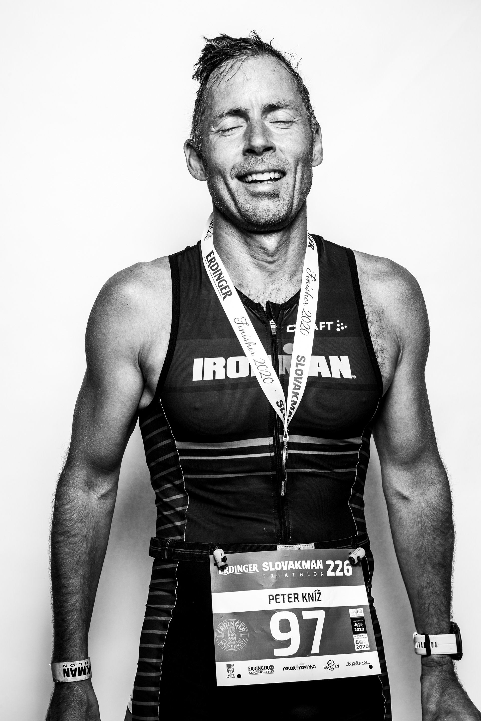 "Face of Endorphines" project - portraits of Ironman triathlon finishers right at the finish line