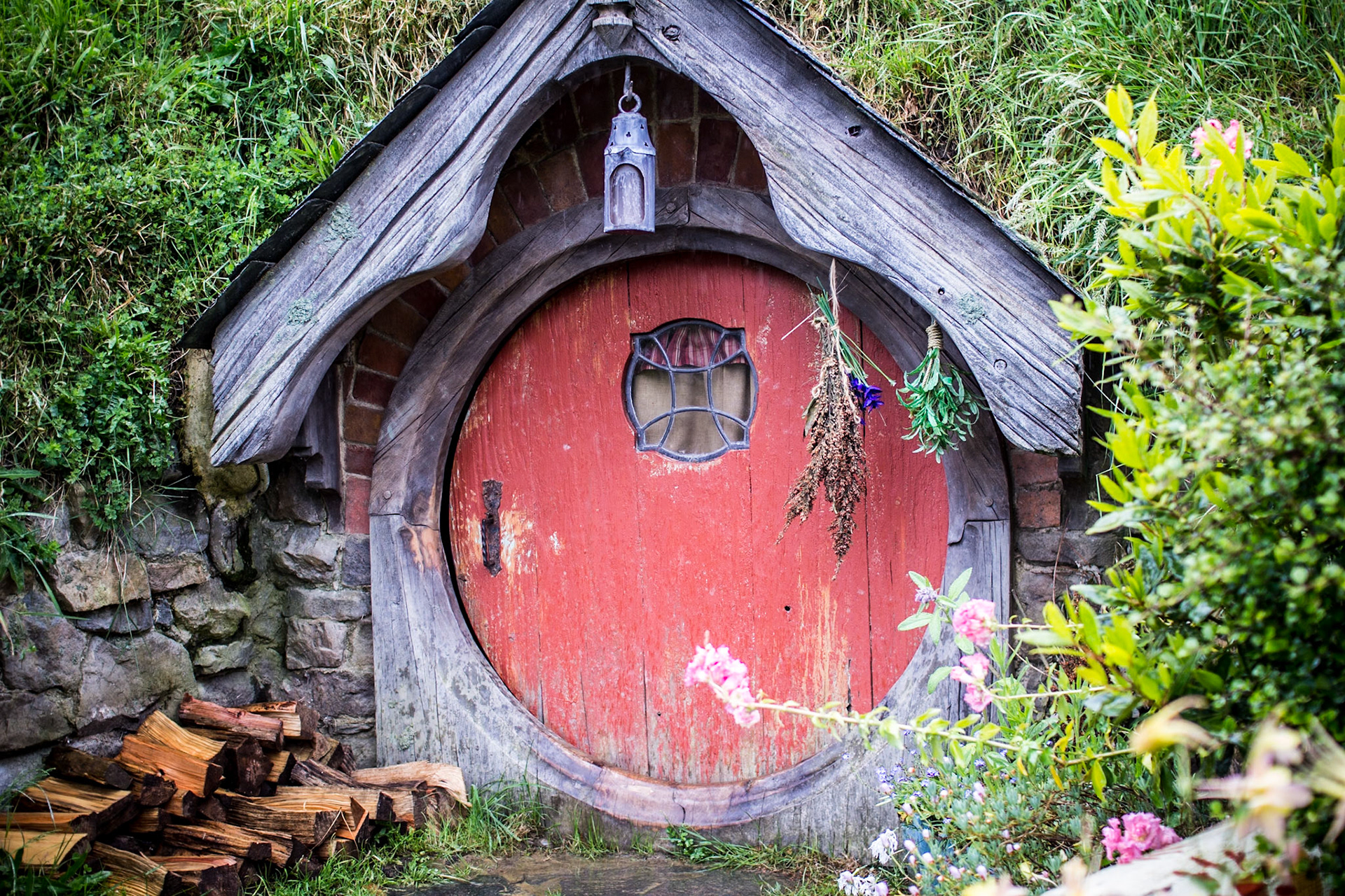 Hobbit hole with a red door