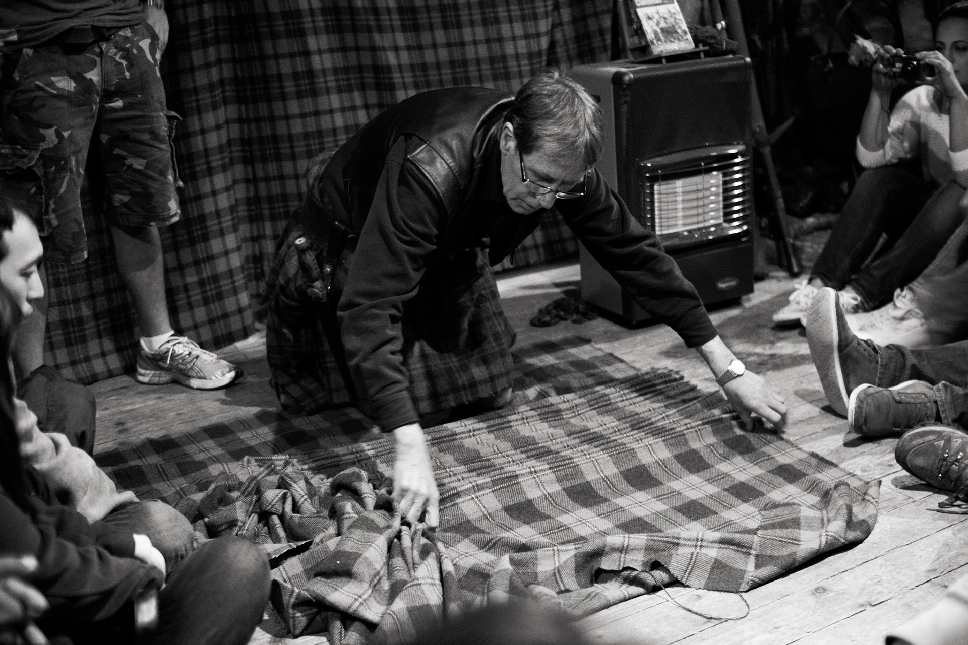 Sexy Ken demonstrates the folding of a kilt