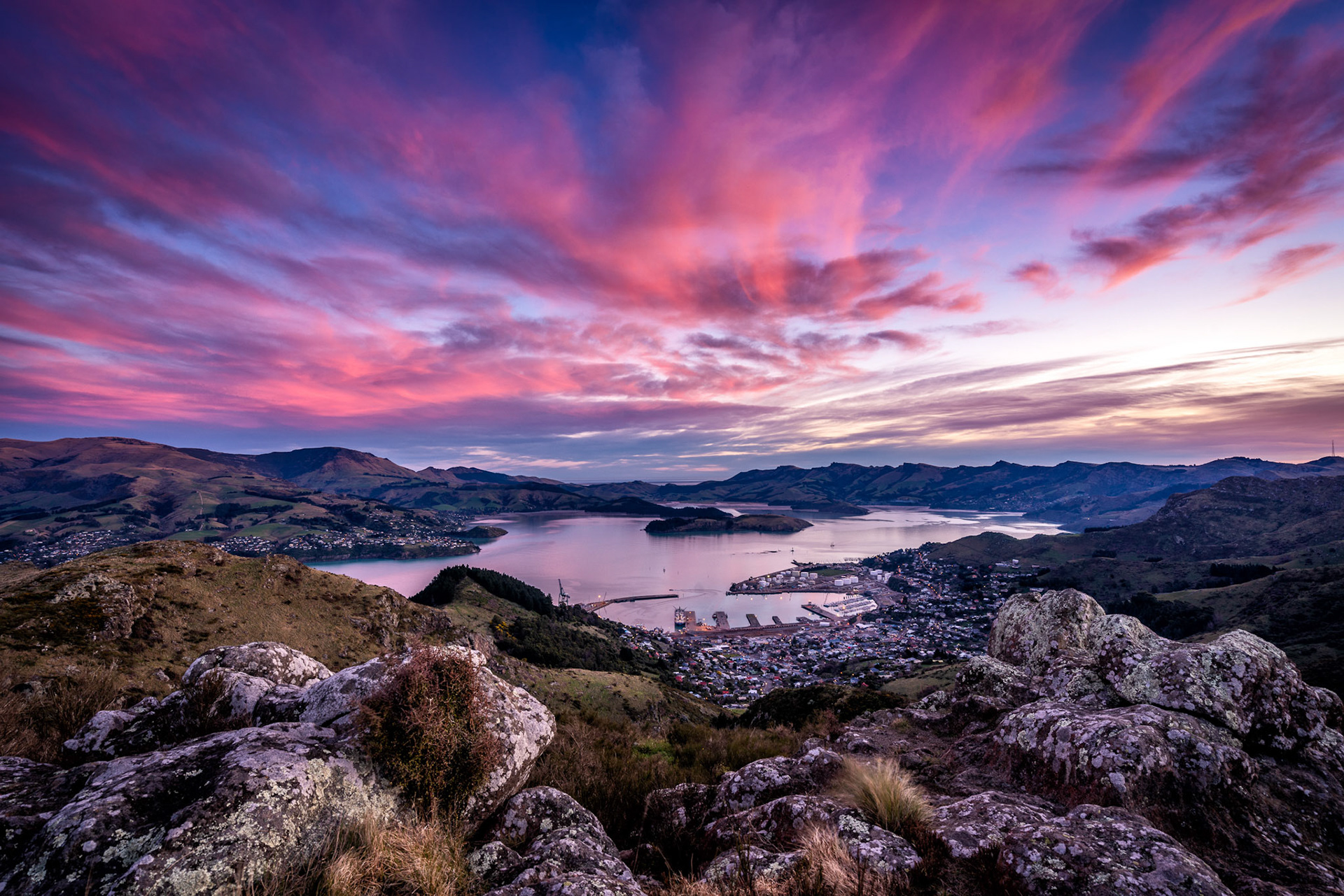 Sunset from the Port Hills overlooking Lyttelton Port and the Whakaraupō Harbour.