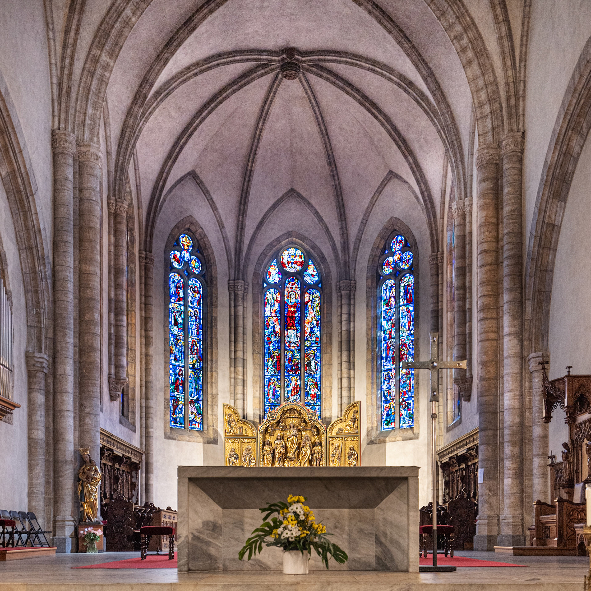 stained glass windows in the apse by Auguste Wanner