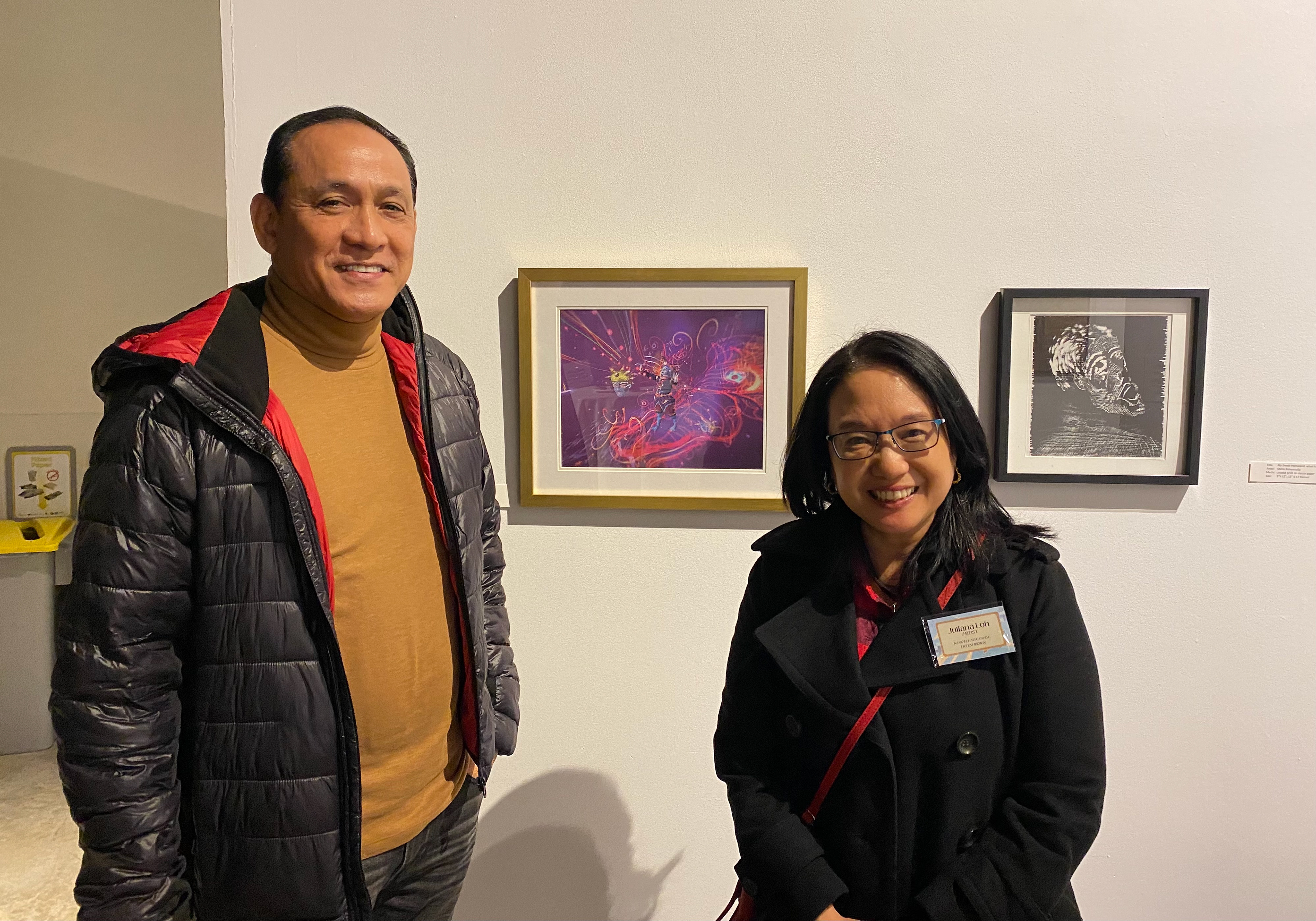 Ed Lantin of Dimasalang III and I in front of my art