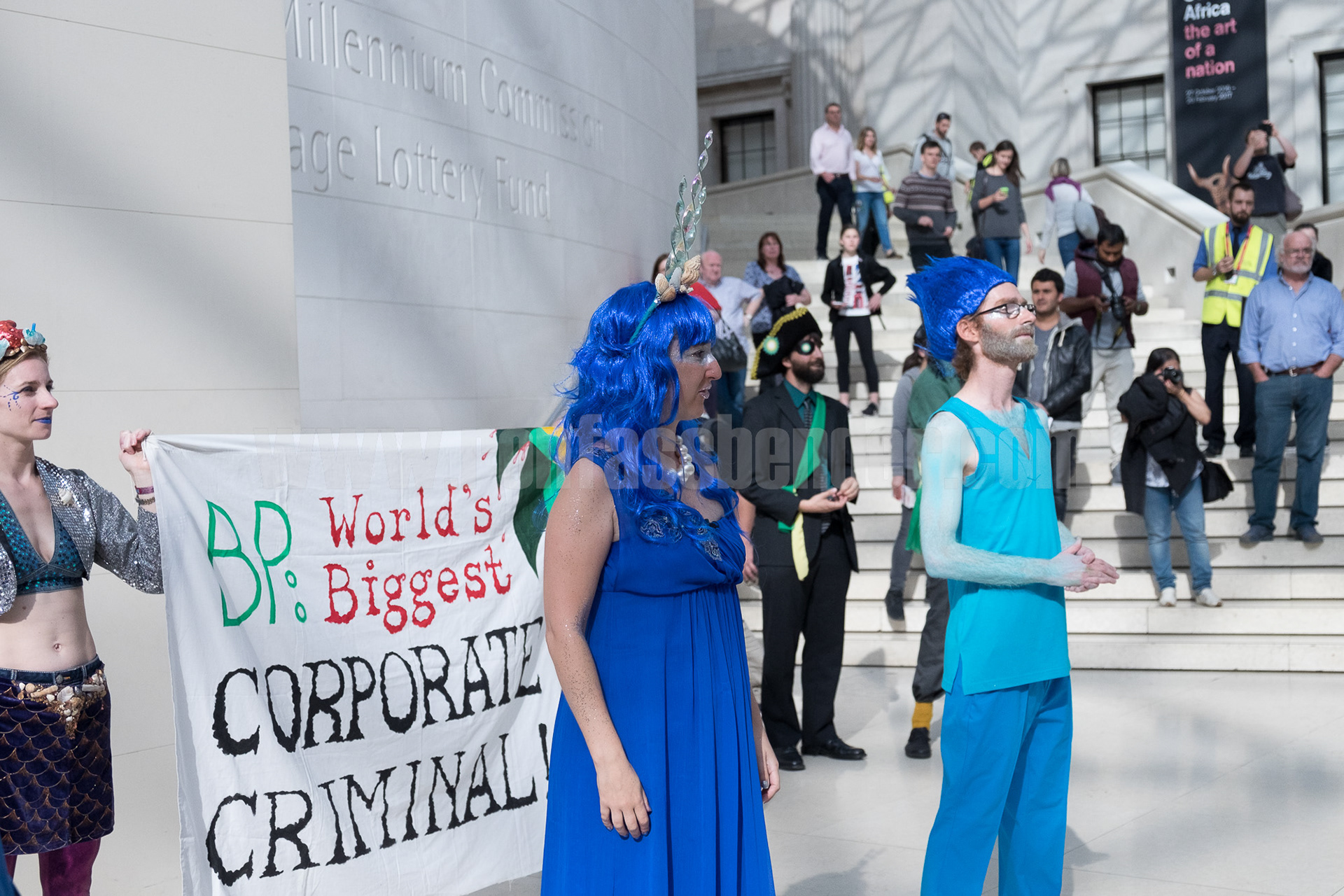 Climate activists stage a performance protest against BP sponsorship of the British Museum. © Ron Fassbender