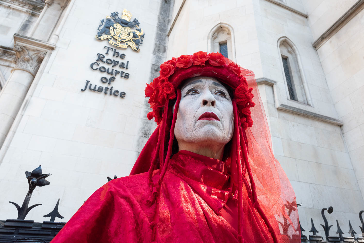 Red Rebel at the Royal Courts of Justice during an appeal against gas drilling in Surrey. © Ron Fassbender