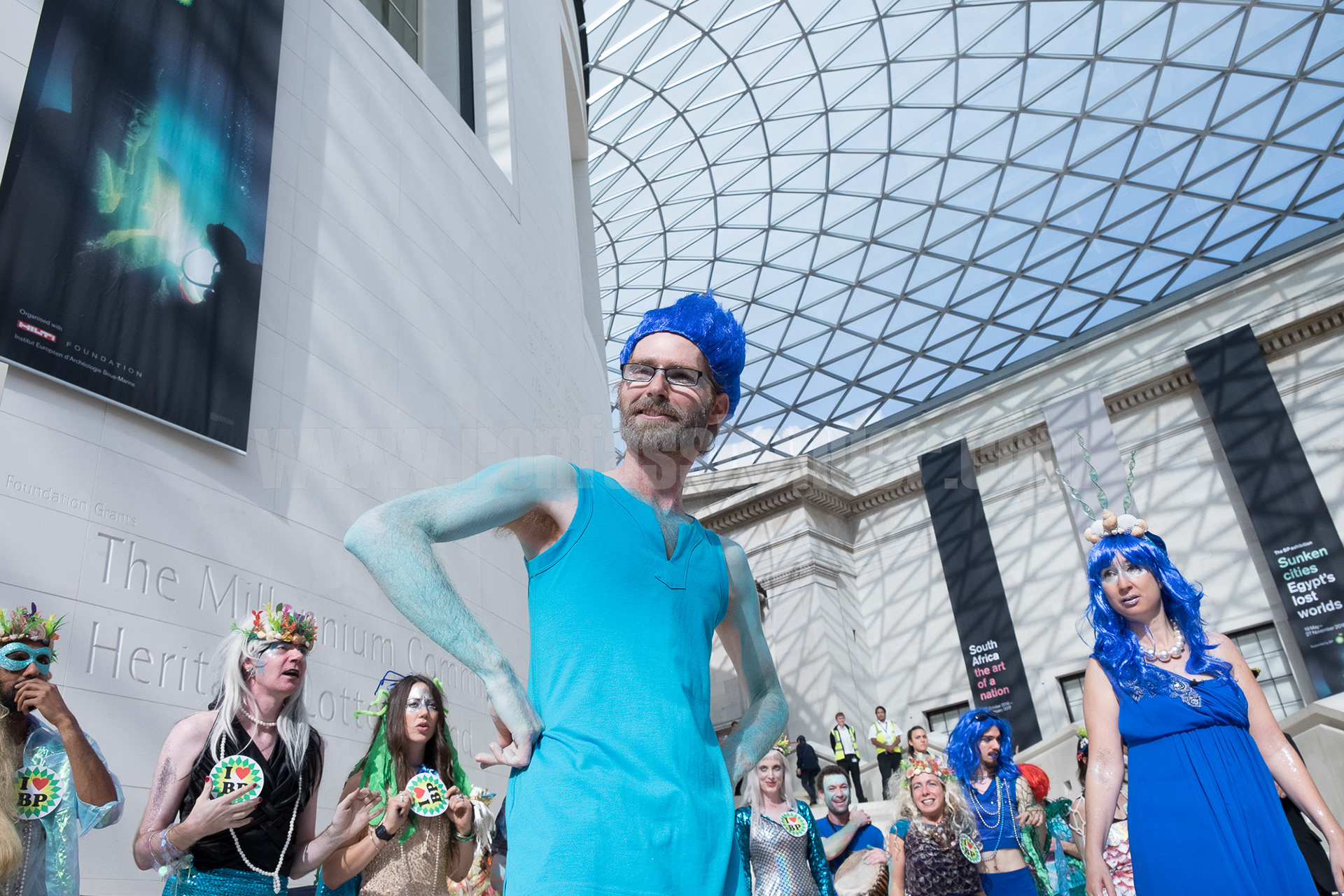 Climate activists stage a performance protest against BP sponsorship of the British Museum. © Ron Fassbender