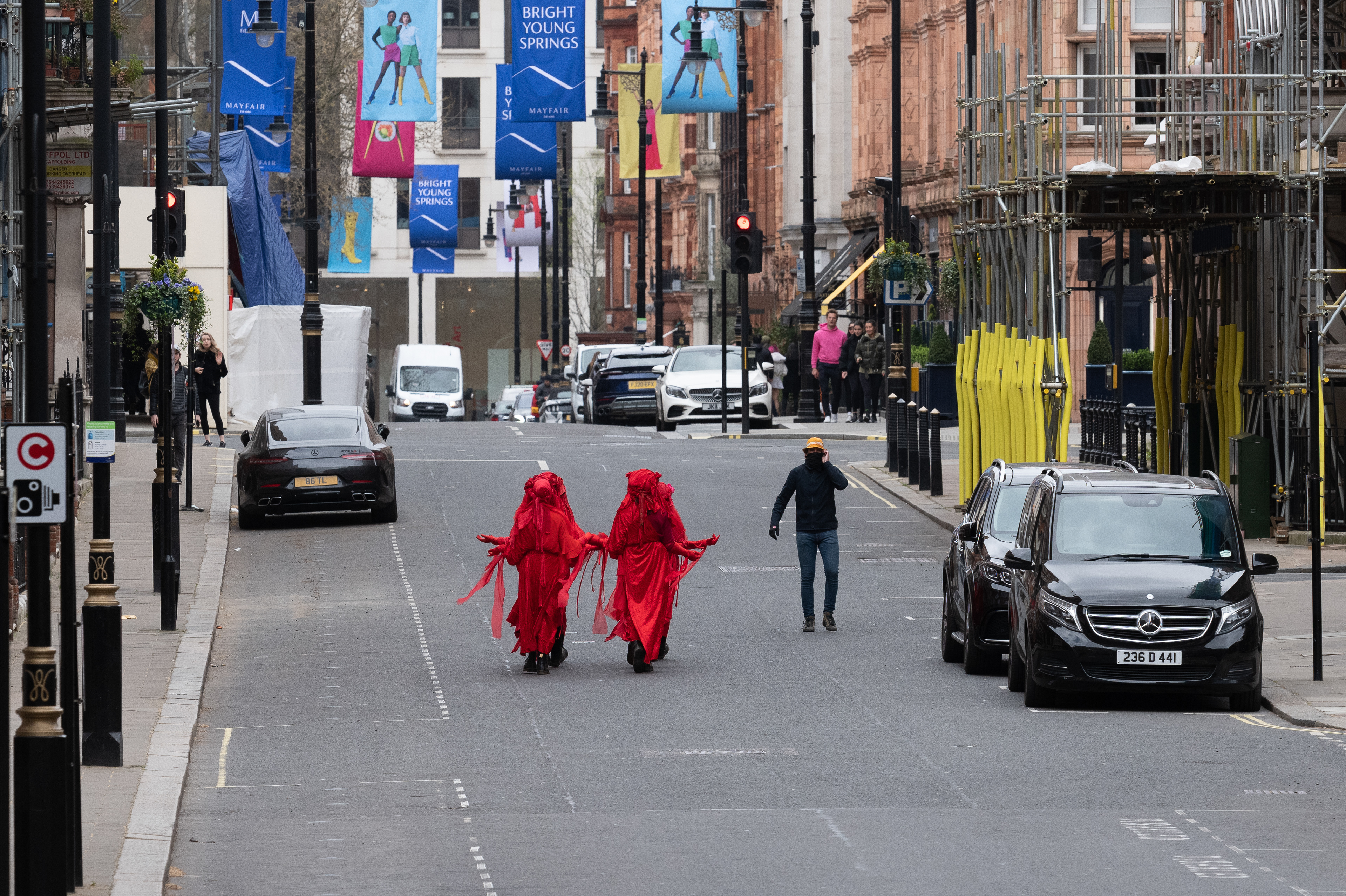 Red Rebel Brigade head off to their next destination. © Ron Fassbender