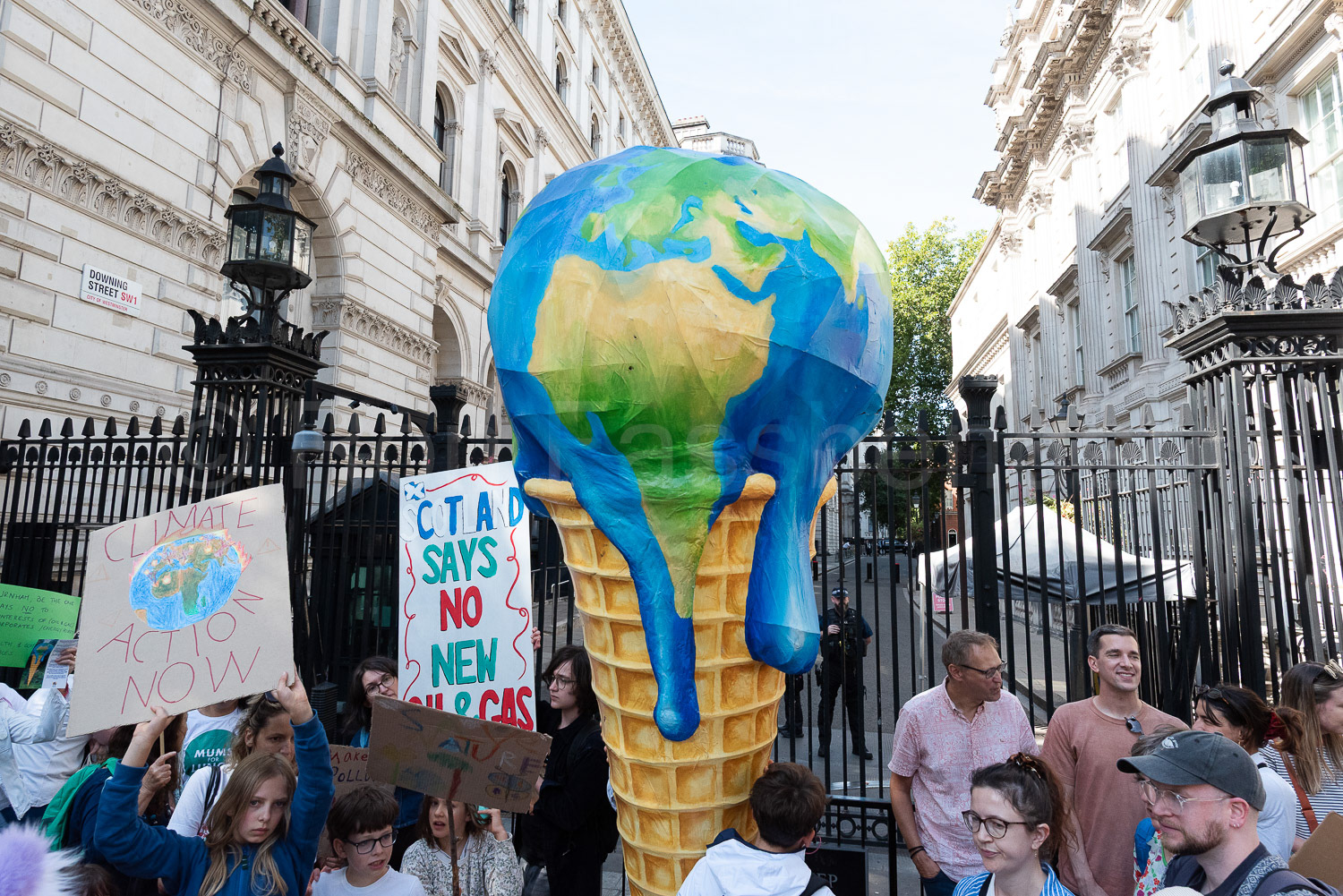 A prop depicting Earth as a melting ice cream cone is shown outside Downing Street, London. 