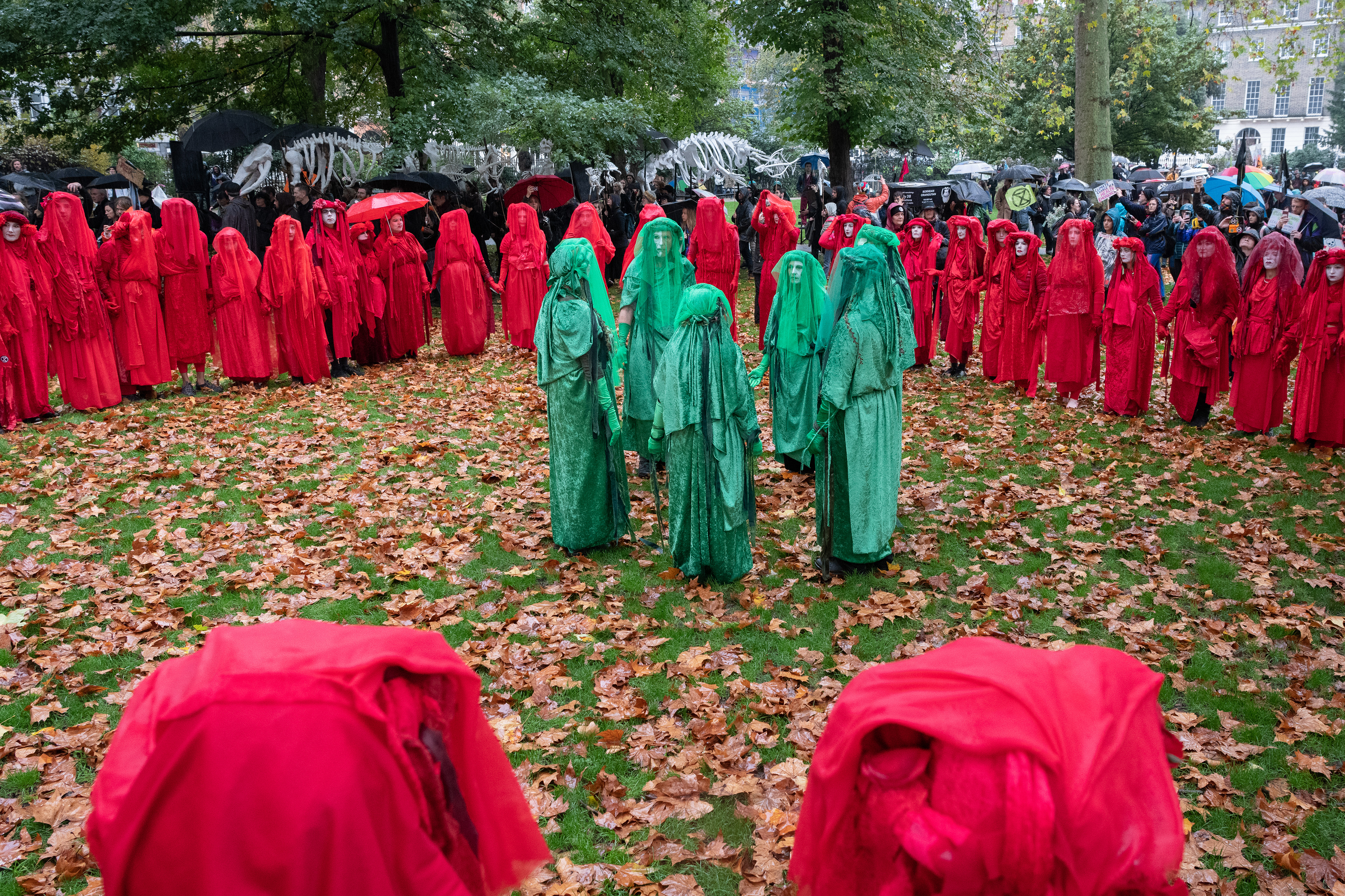 Red Rebel Brigade and the Green Spirits in Russell Square for the Strength in Grief action. © Ron Fassbender