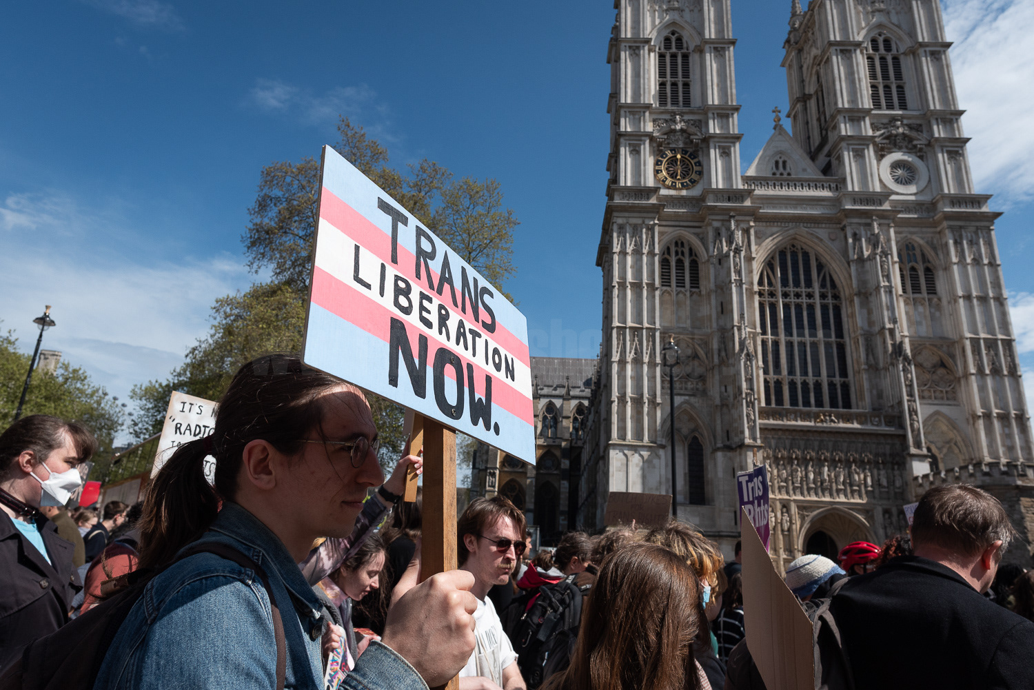 Trans rights demo passes Westminster Abbey, London © Ron Fassbender