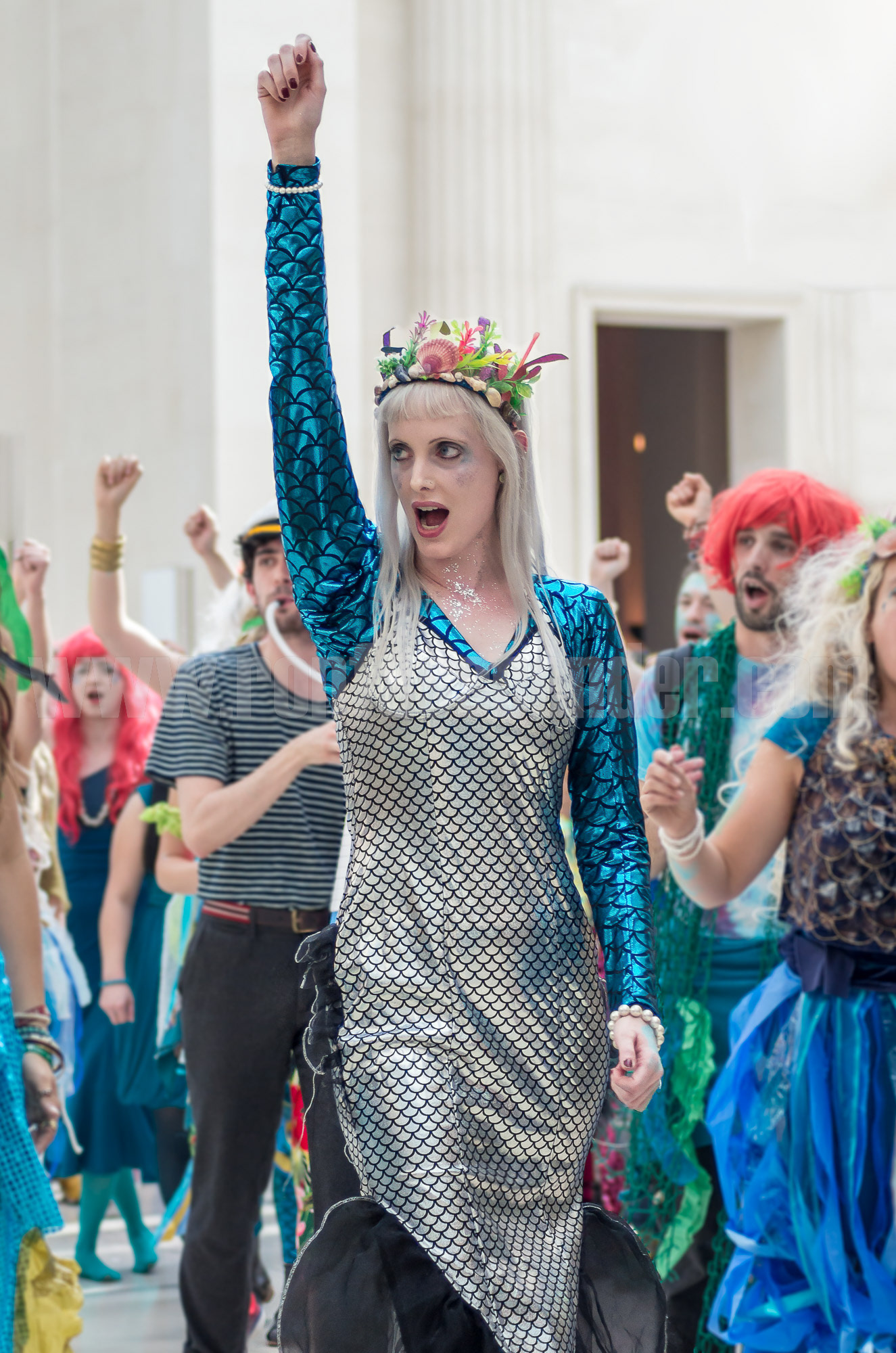 An activist dressed as a mermaid during a performance protest against sponsorship of the British Museum's 'Sunken Cities' exhibition by oil company BP. © Ron Fassbender