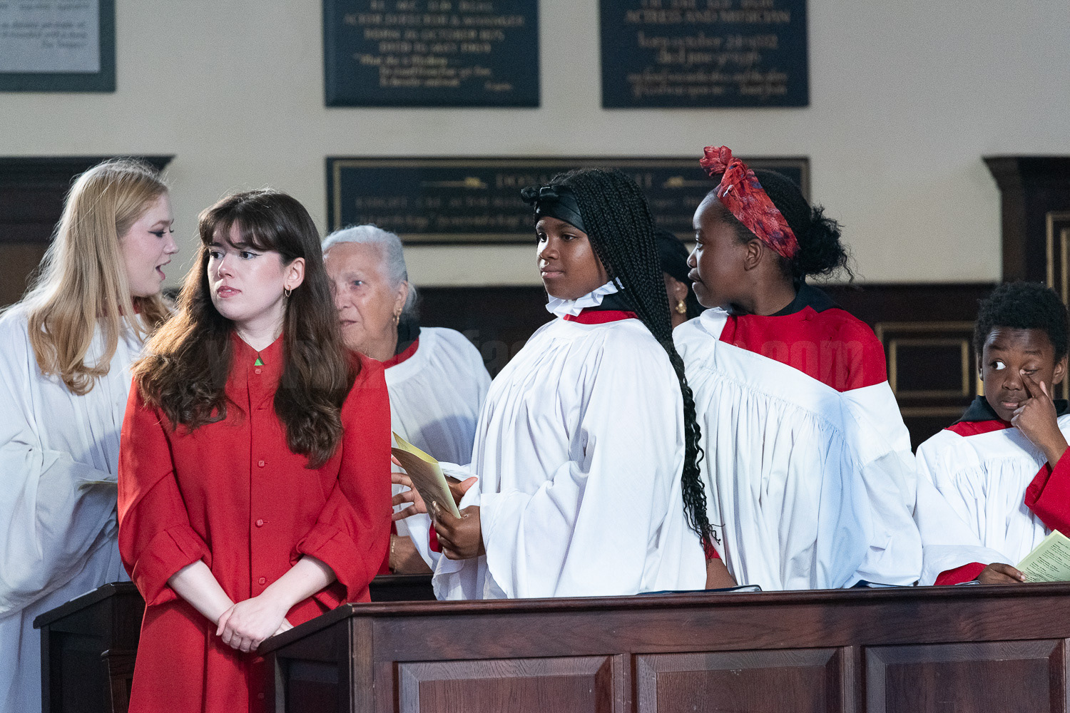 The choir prepare to perform at the Puppet Service in St Paul's Church. The Superior Brass Band lead a procession around Covent Garden © Ron Fassbender