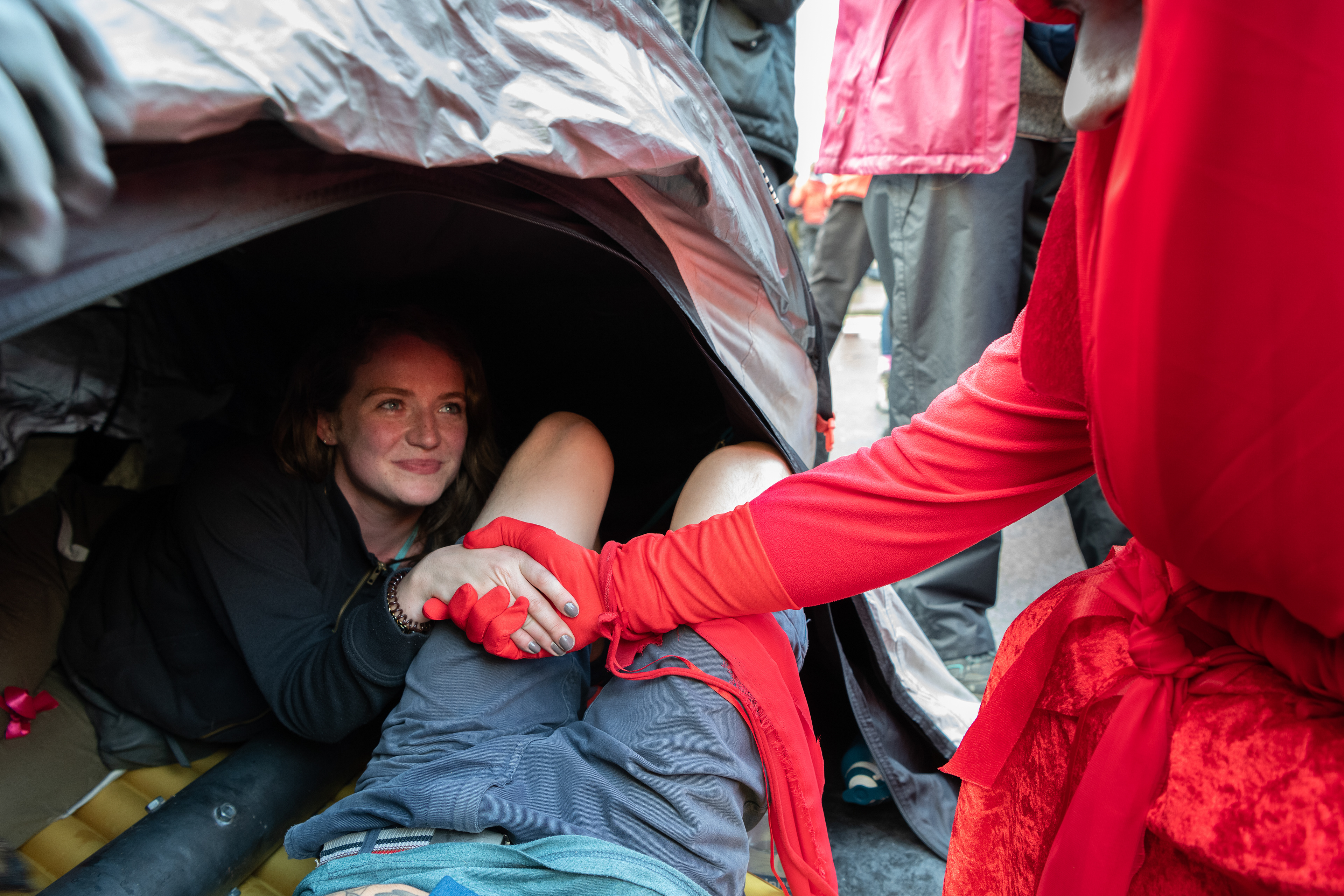 Red Rebel Brigade support locked-on activists in Whitehall awaiting arrest. © Ron Fassbender