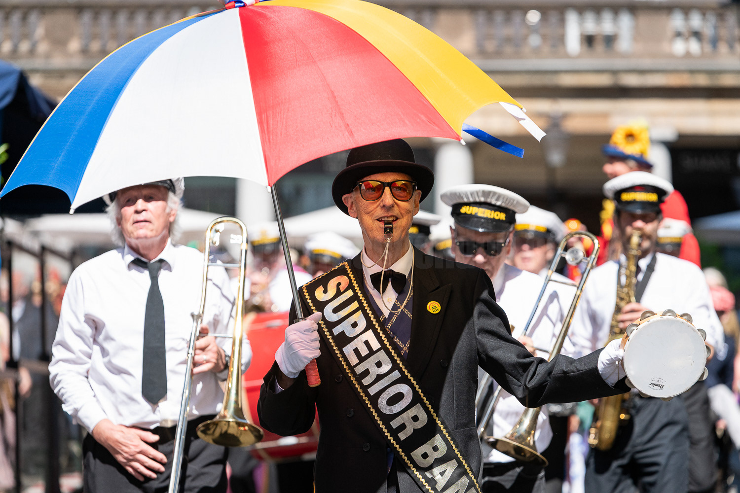 The Superior Brass Band lead a procession around Covent Garden © Ron Fassbender