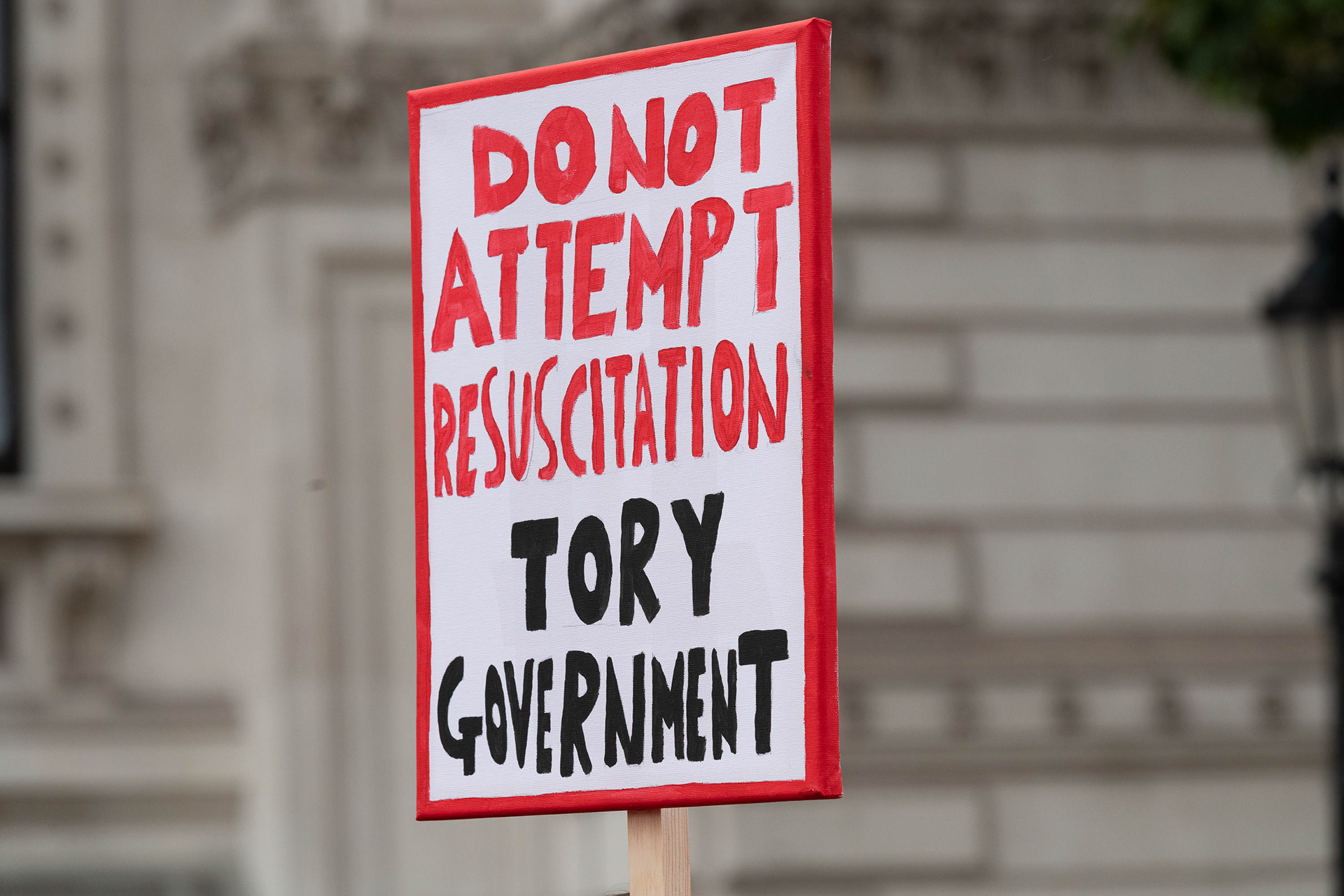 Do Not Attempt Resuscitation of Tory Government placard. © Ron Fassbender