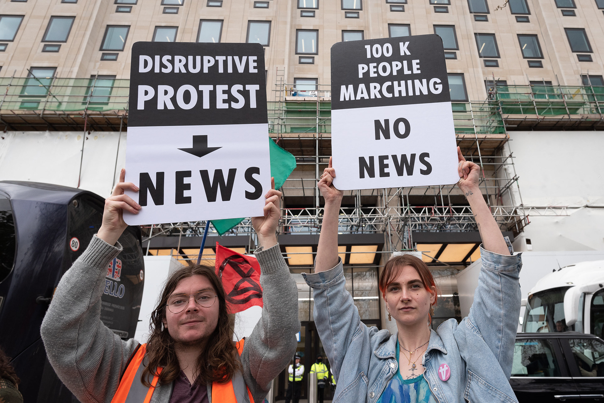 Placards with some shrewd media analysis outside Shell oil HQ © Ron Fassbender