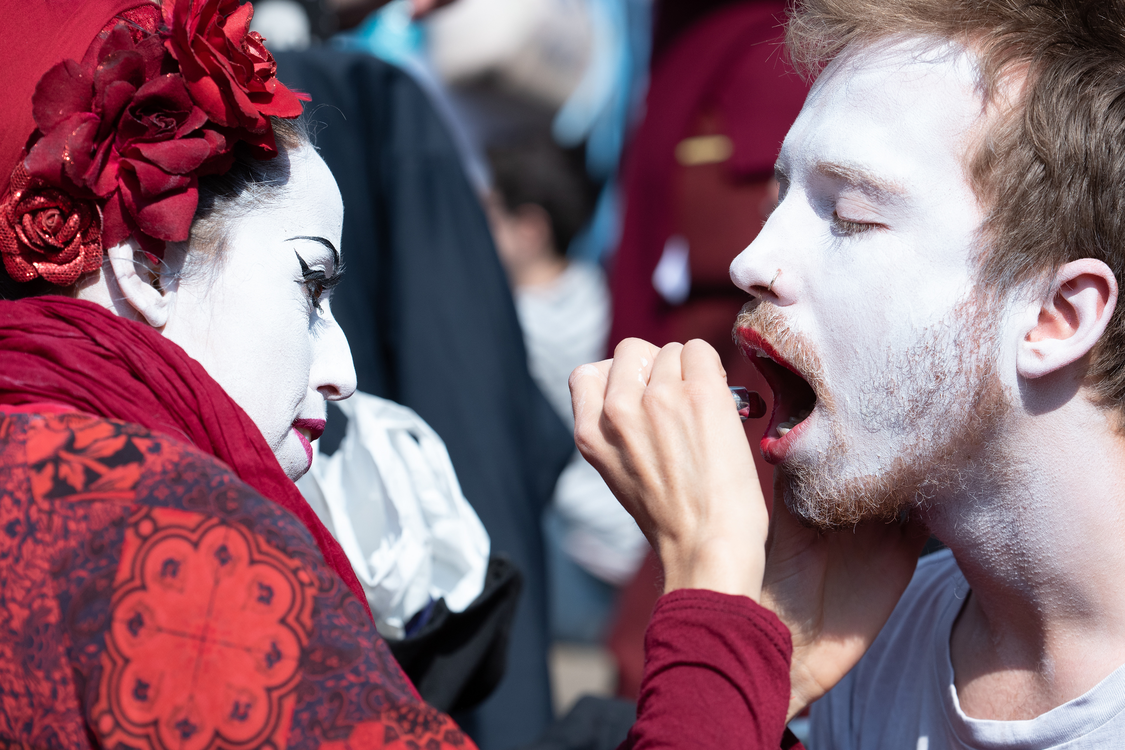 Red Rebel Brigade preparing in Oxford Circus during their first London appearance. © Ron Fassbender