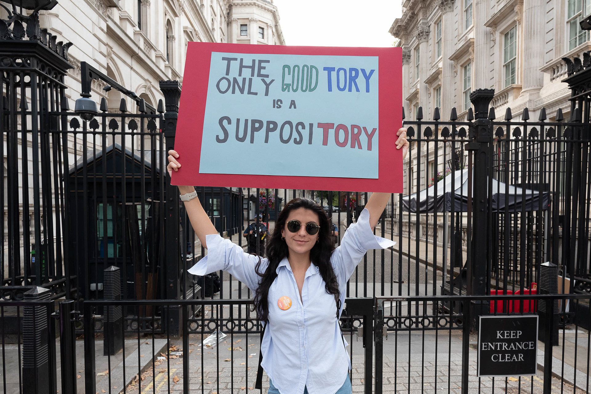 The Only Good Tory is a Suppository placard outside Downing Street. © Ron Fassbender