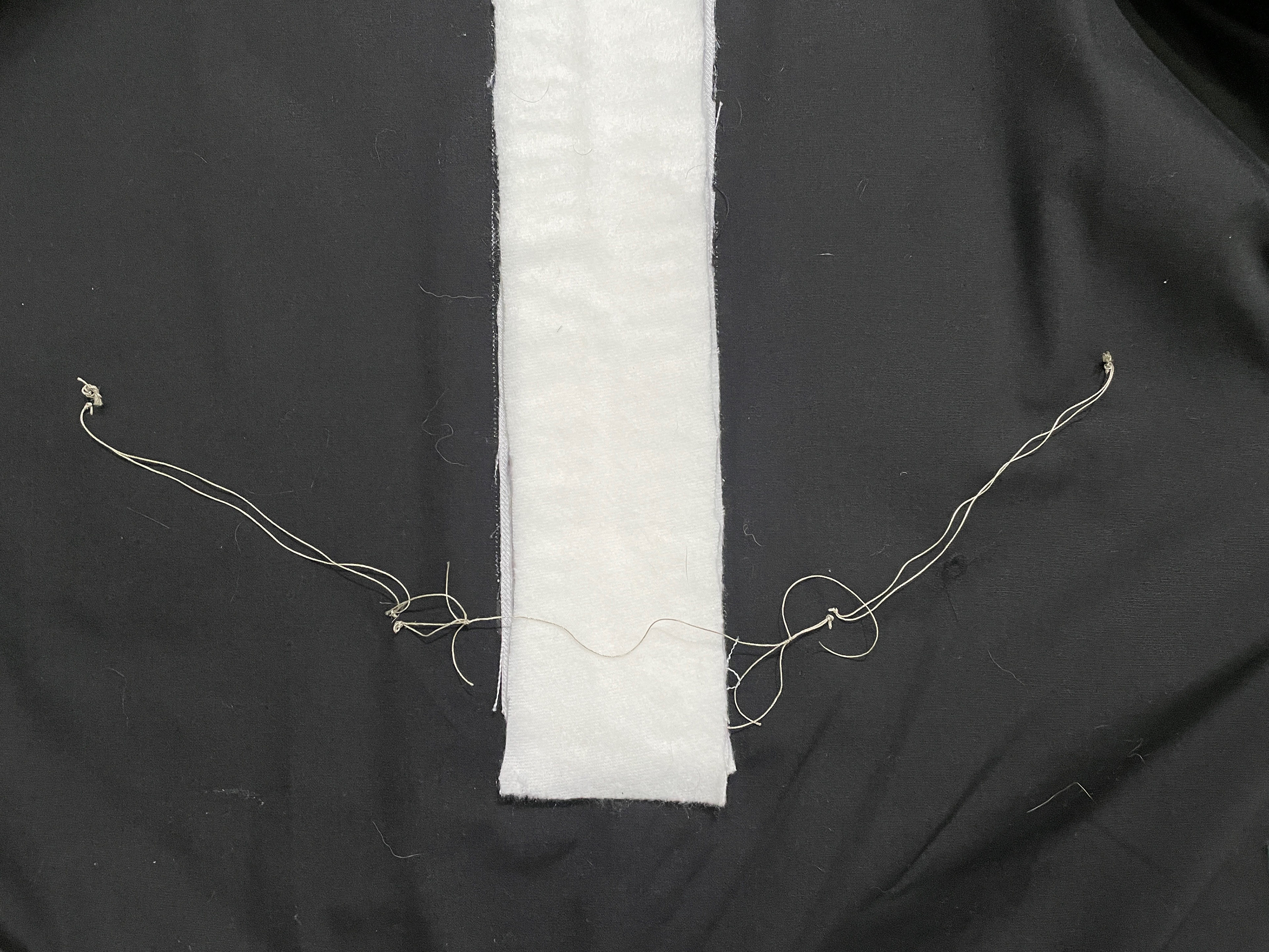 Connecting back pannels with conductive thread