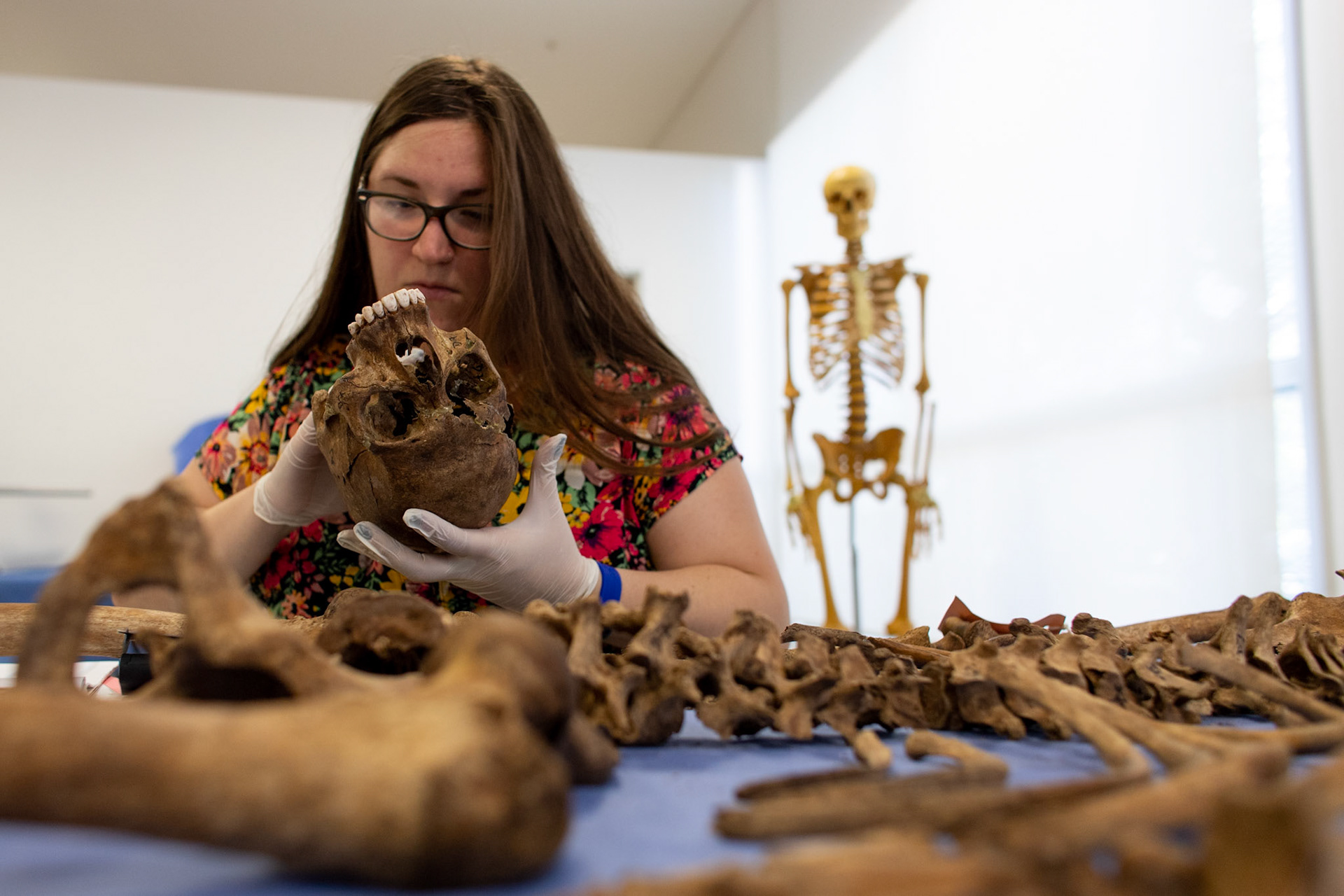 Gala Maruscak member of the Argentine Anthropology Forensic team’s Laboratory examines the skeleton of an unidentified missing person in the City of Buenos Aires, Argentina.

Gala Maruscak member of the Argentine Anthropology Forensic team’s Laboratory examines the skeleton of an unidentified missing person in the City of Buenos Aires, Argentina.