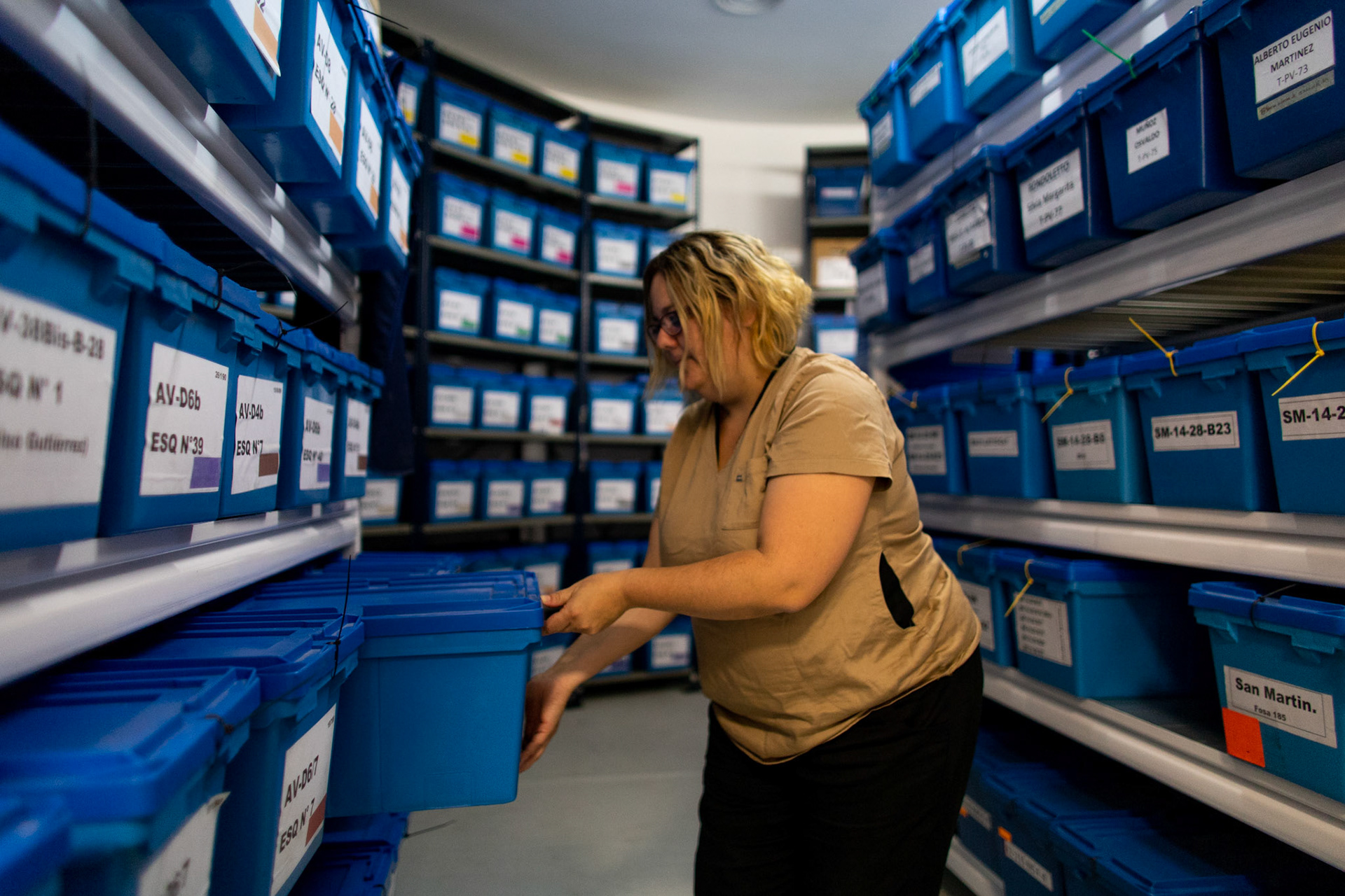 Mariana Selva coordinator of the Argentine Anthropology Forensic team’s Laboratory rumages through boxes with remains of unidentified missing persons in the City of Buenos Aires, Argentina.
Mariana Selva coordinator of the Argentine Anthropology Forensic team’s Laboratory rumages through boxes with remains of unidentified missing persons in the City of Buenos Aires, Argentina.