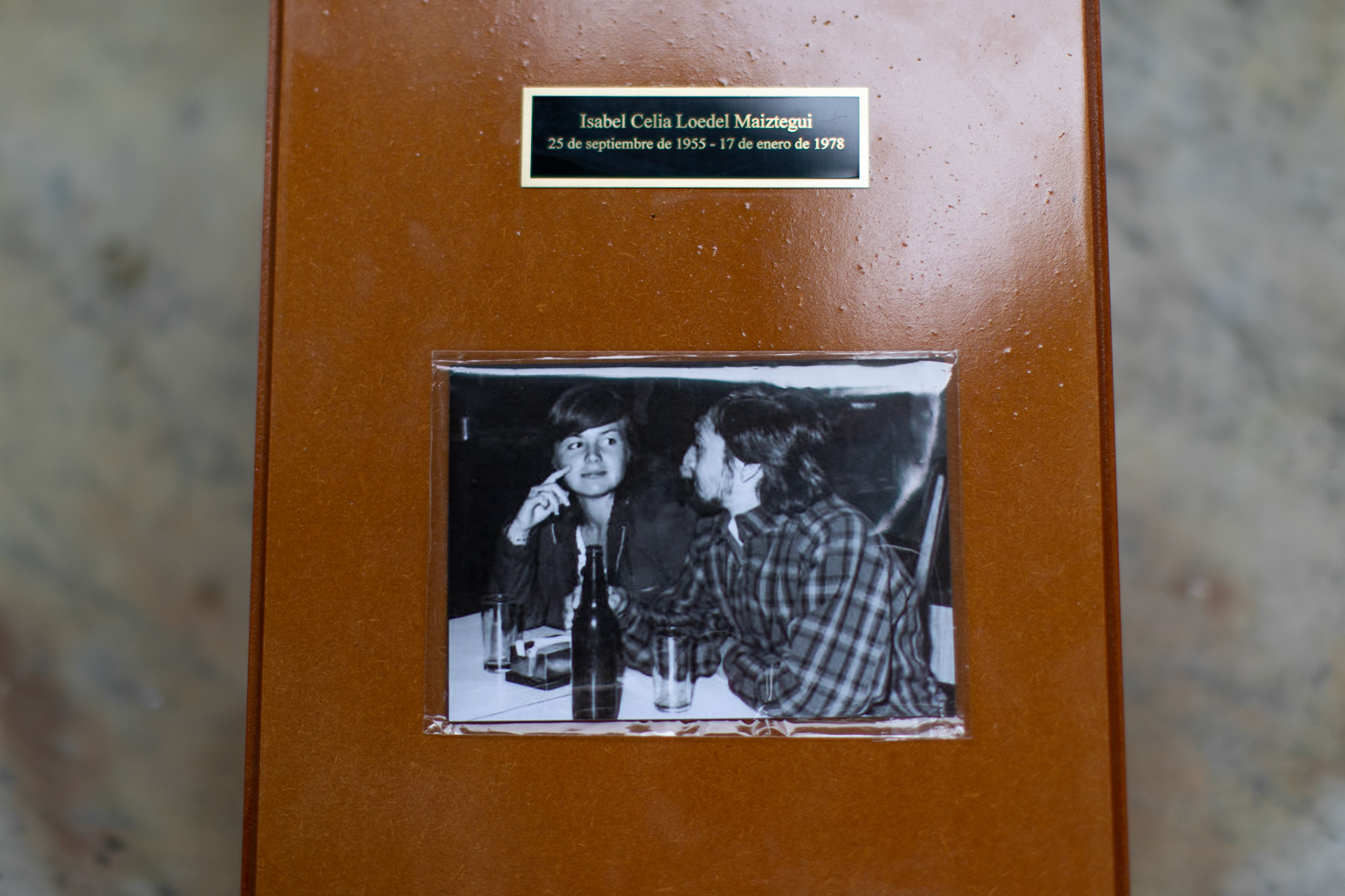 A box with Isabel Celia Loedel Maiztegui's remains and a photo of her with her partner at the La Plata Cementery in the city of La Plata, Buenos Aires.