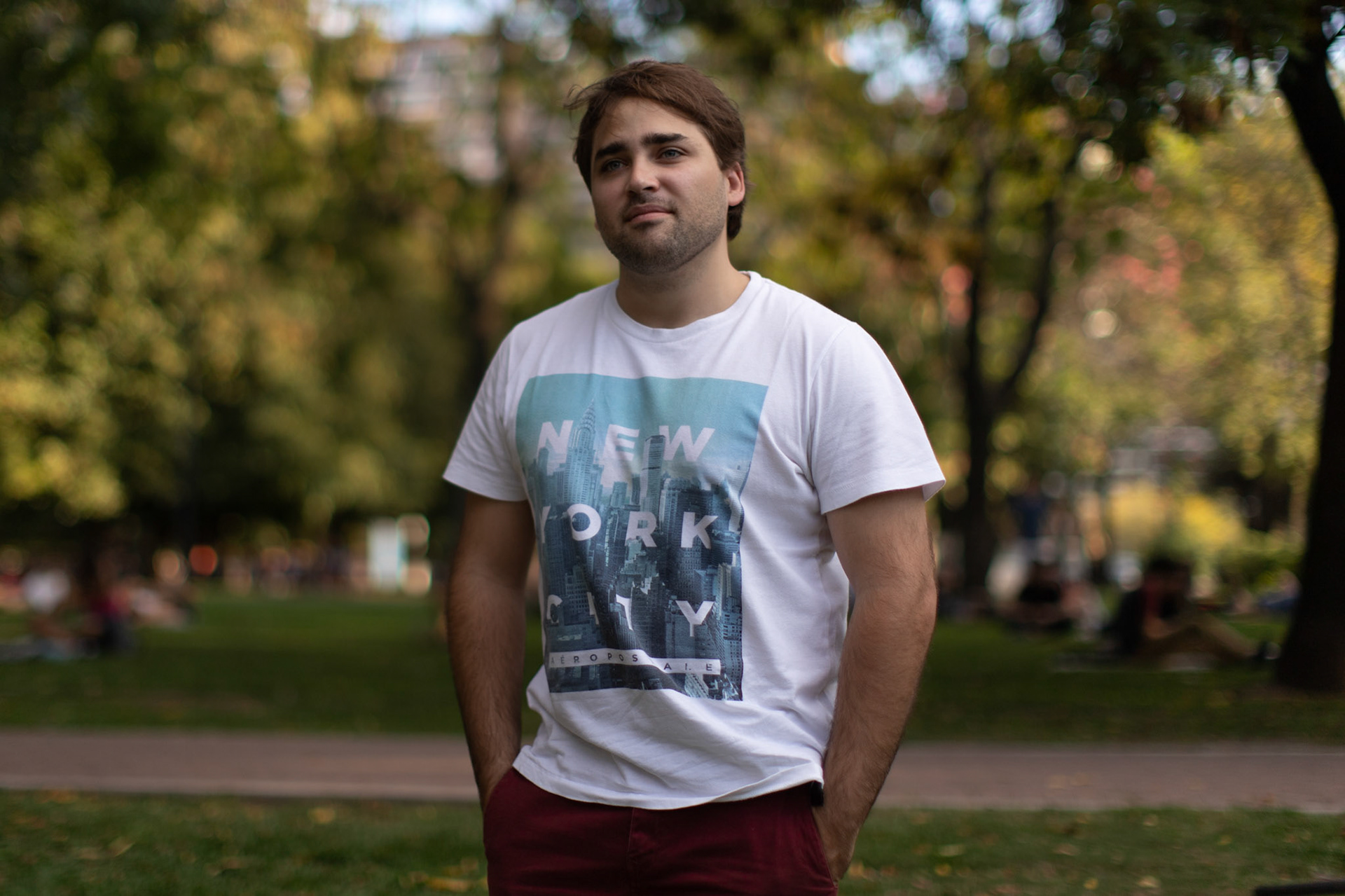 In this April 2, 2019, photo, Tomás Ruiz, 27, poses for a photo at the Las Heras park in the City of Buenos Aires, Argentina. Before moving to Dublin, Ireland in search of work.