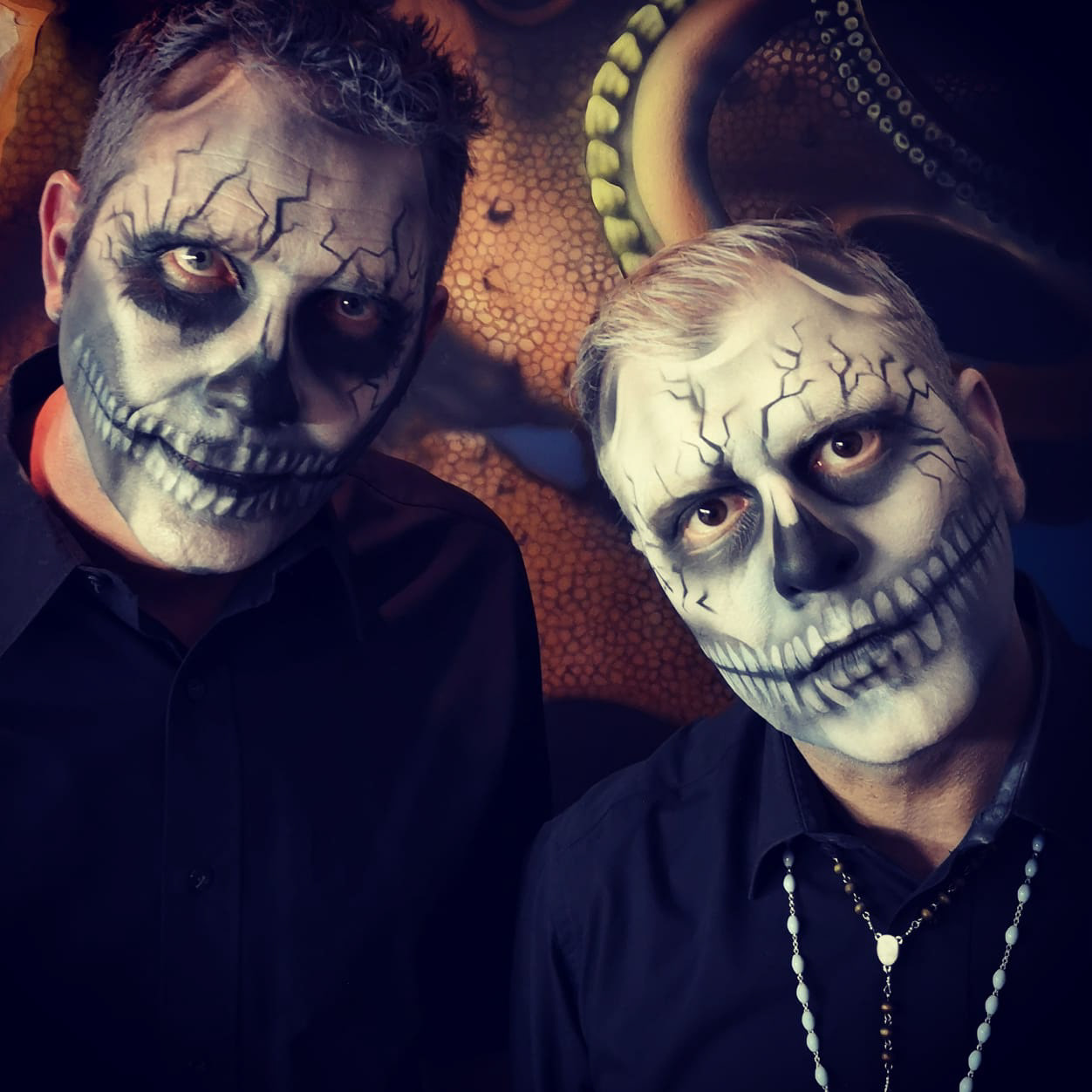 facepaint makeup halloween sugar skull theme on octopus mural background