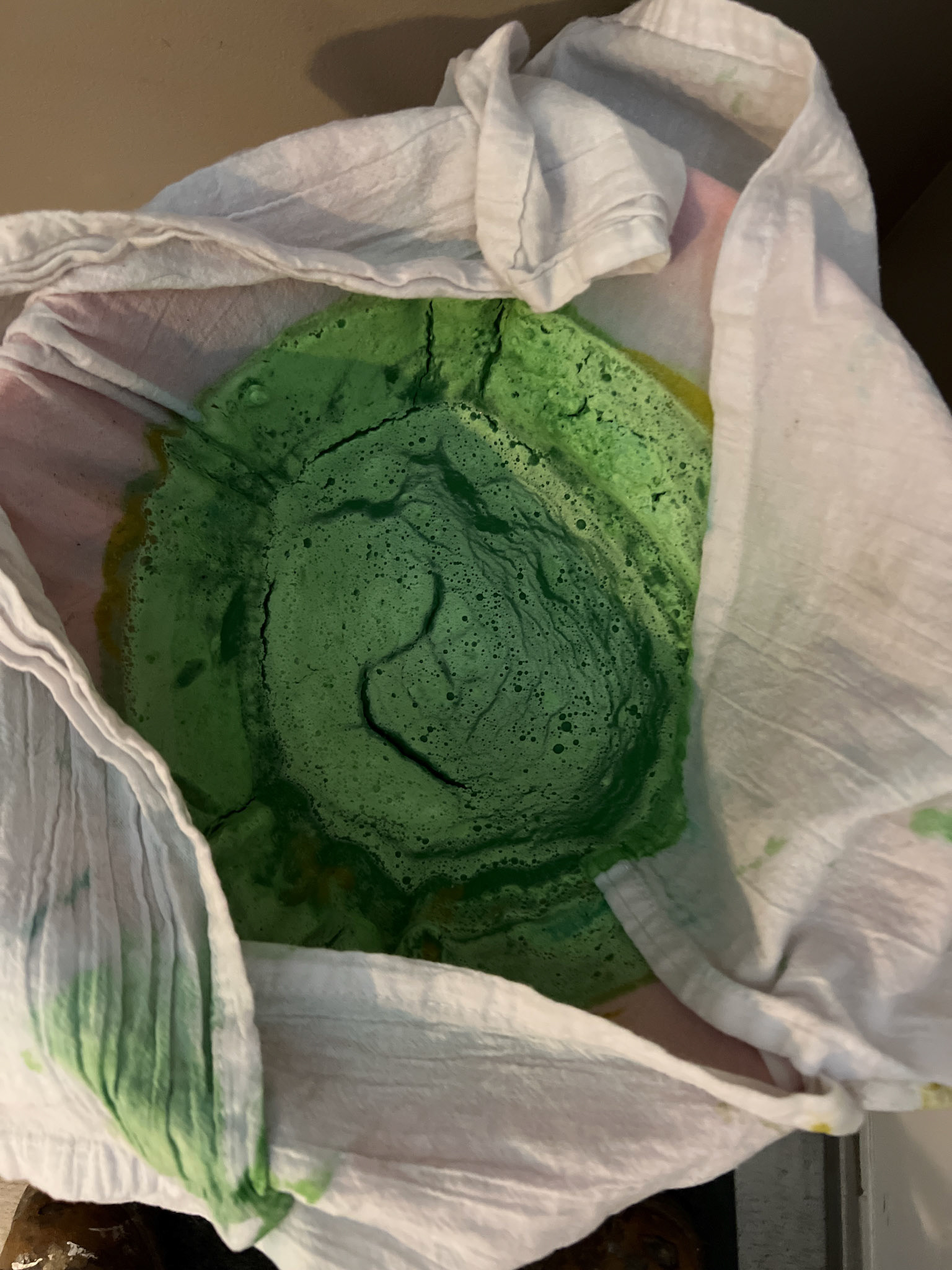 straining the pigment to dry and store