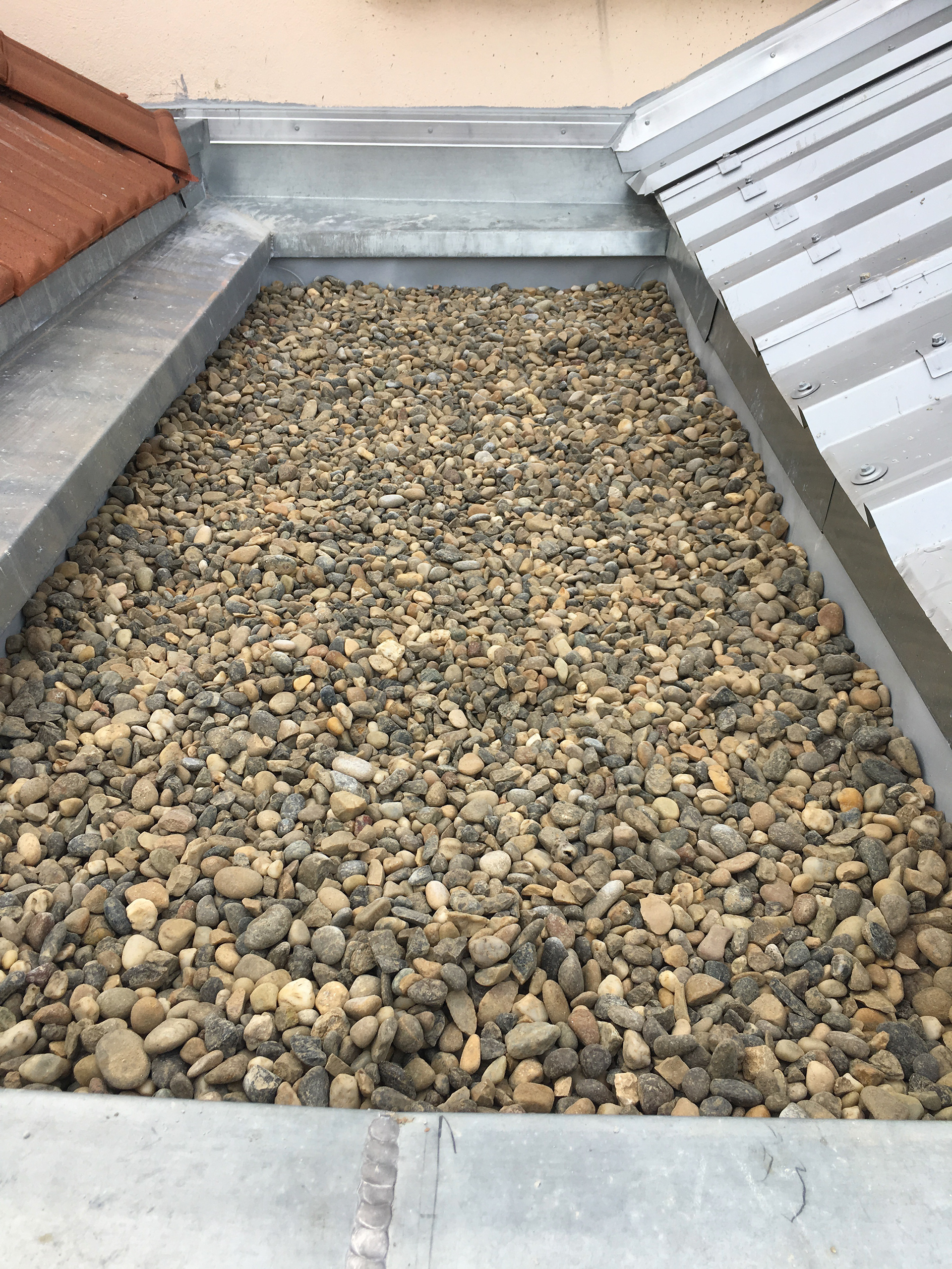 graviers sur toit terrasse