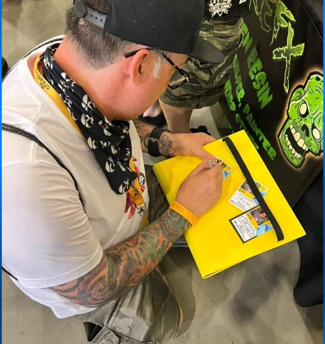 Signing my trading cards at Monsterpalooza 2022