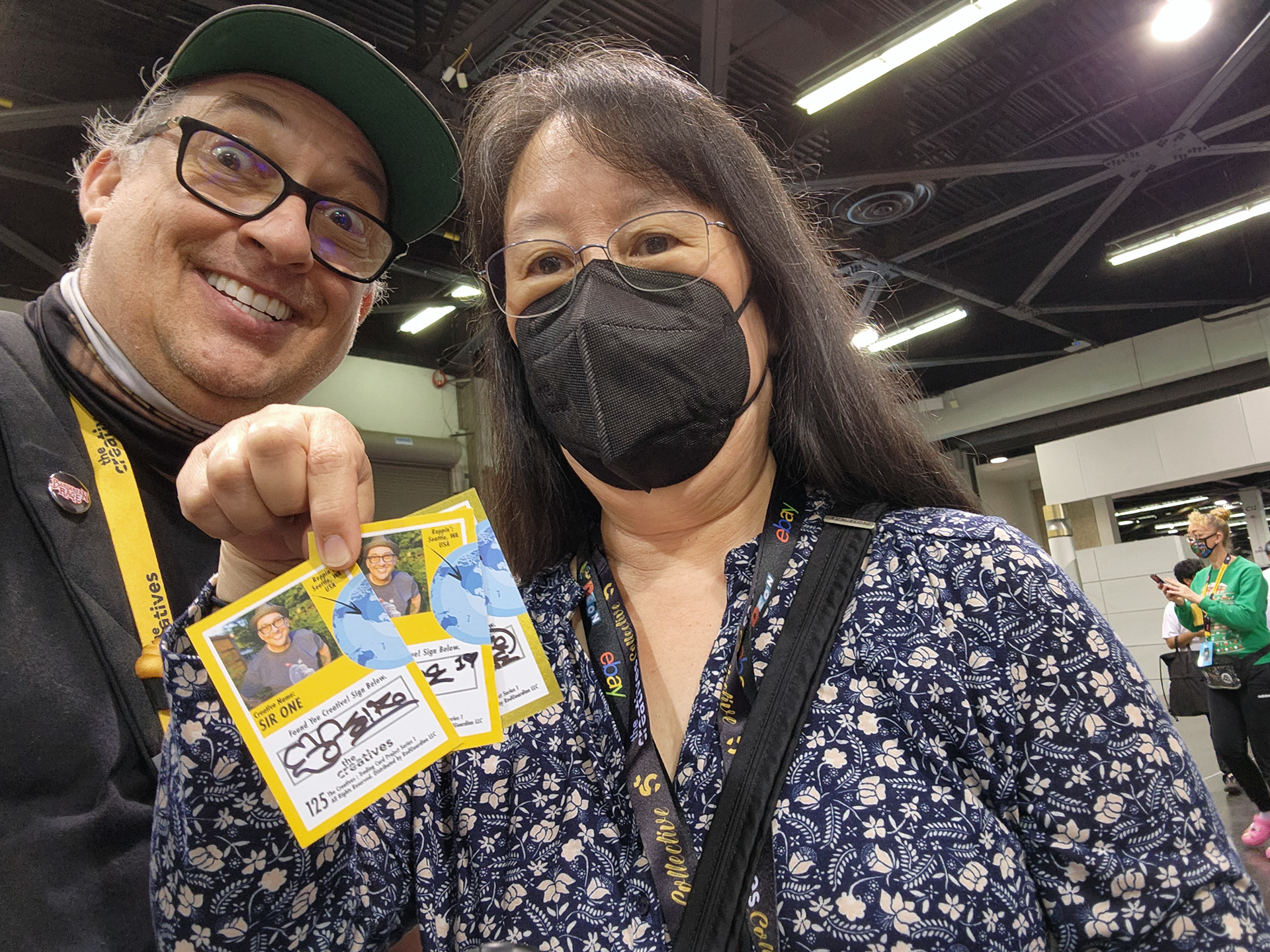 Signing my trading cards at DCON 2022