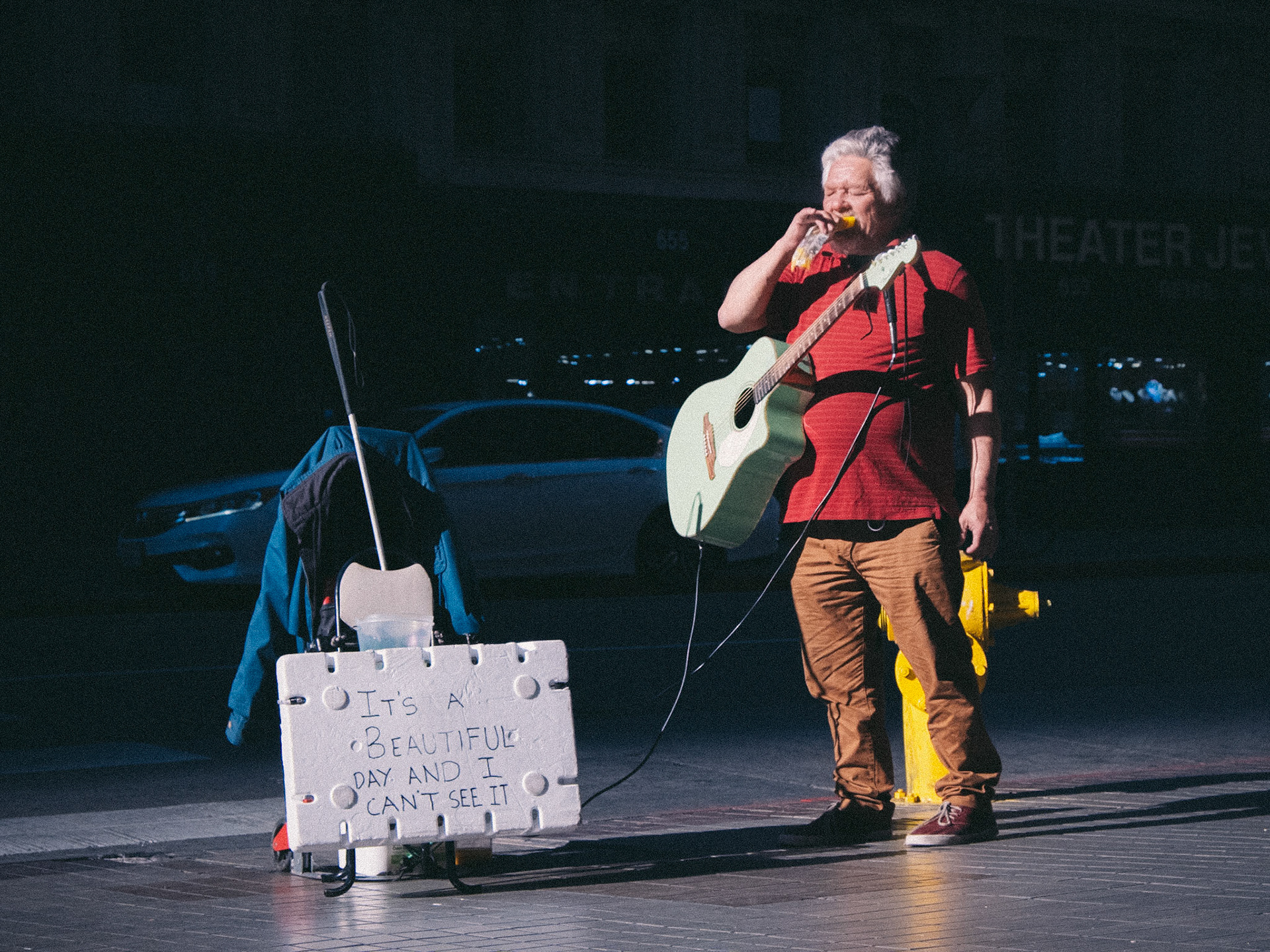 A blind artist taking a break