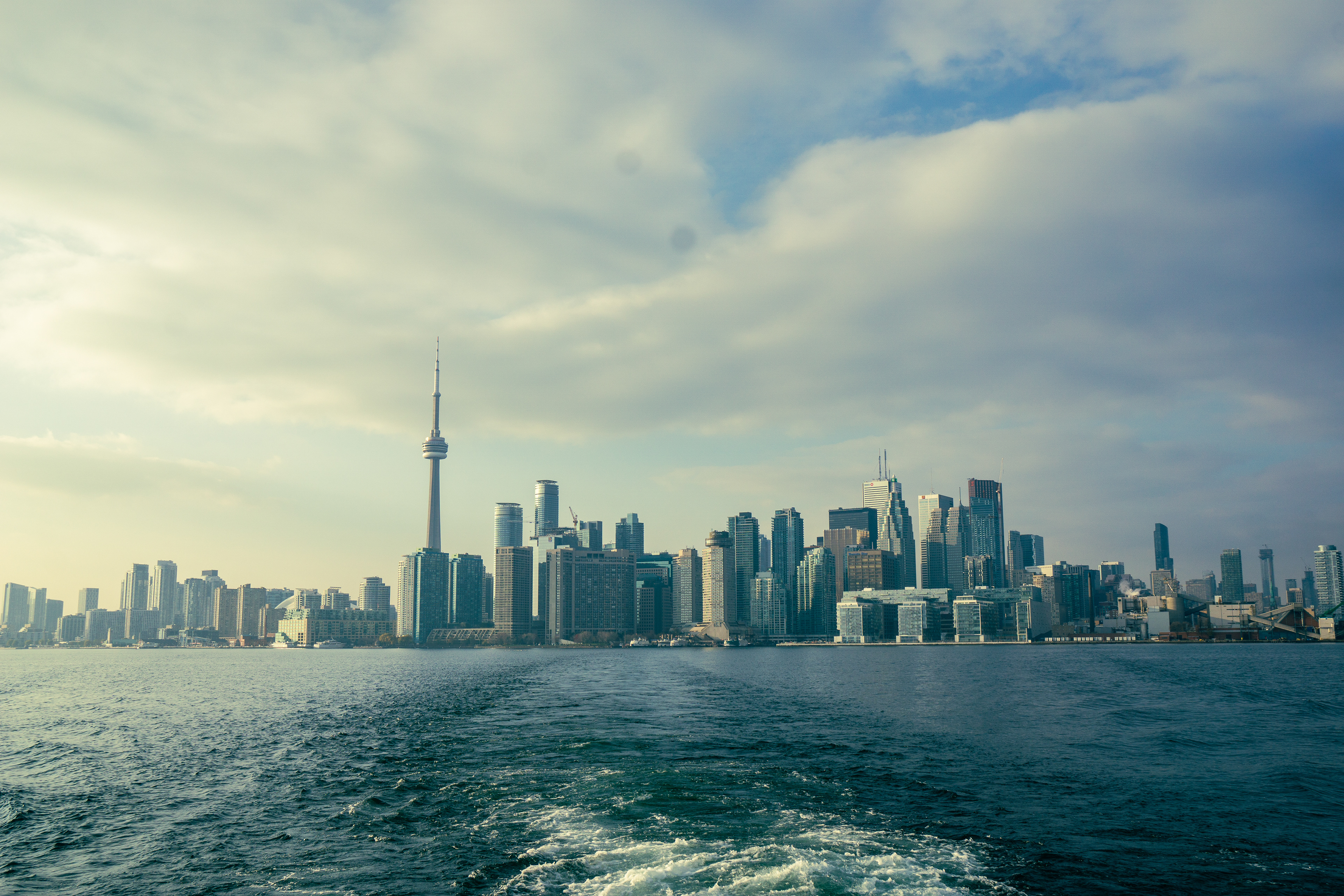 Toronto skyline with CN Tower viewed from waterfront.
