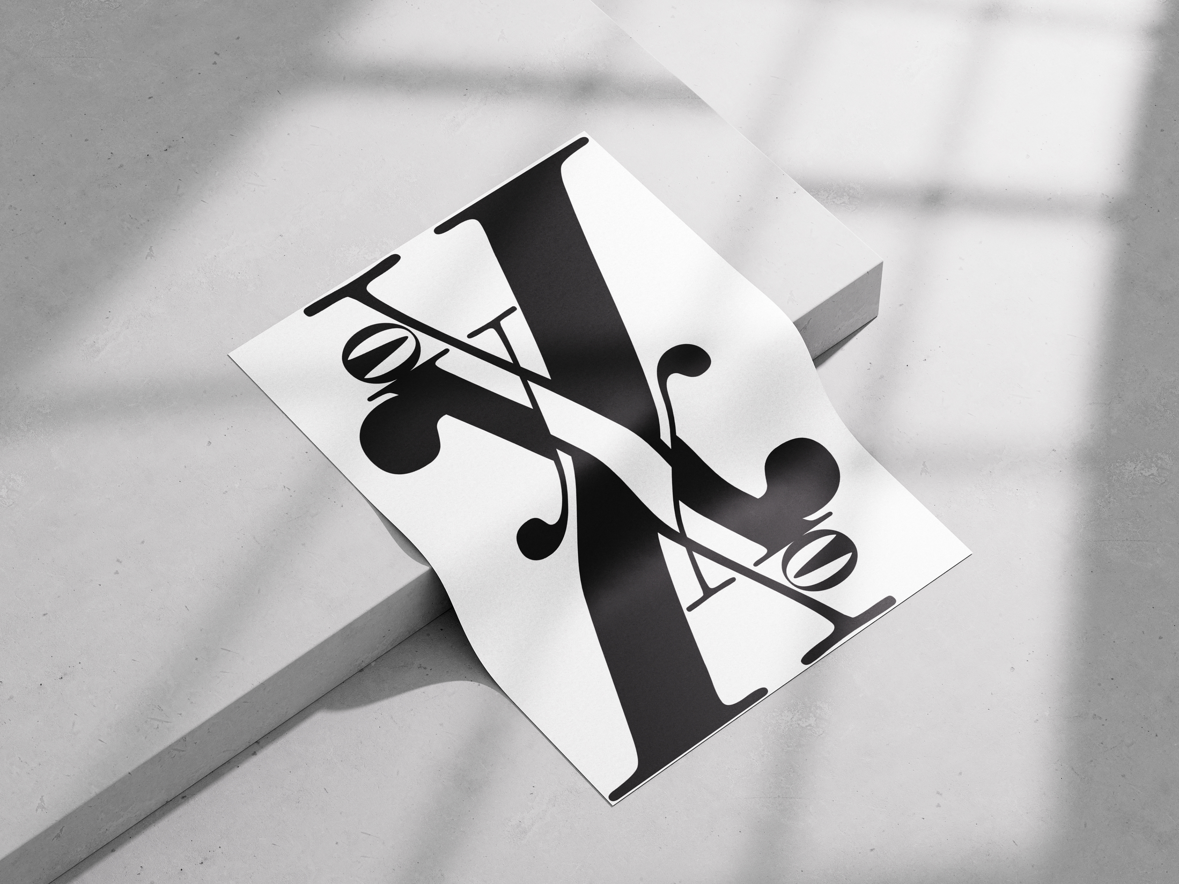Black and white typographic poster with large ornamental K and intersecting X, featuring abstract forms, eye motifs, and modernist symbolism.