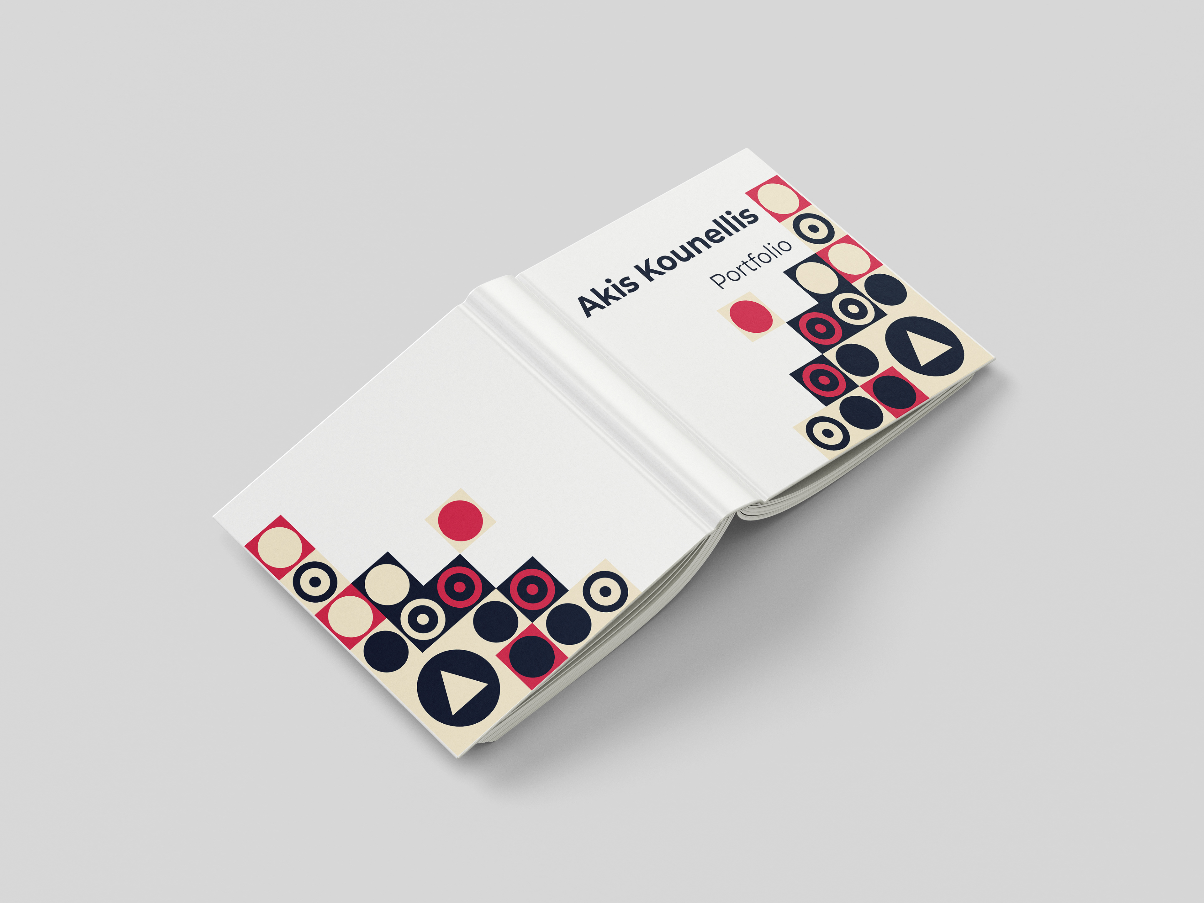 Editorial design book spread with abstract geometric pattern of red, black, and beige circles paired with minimalist typography.