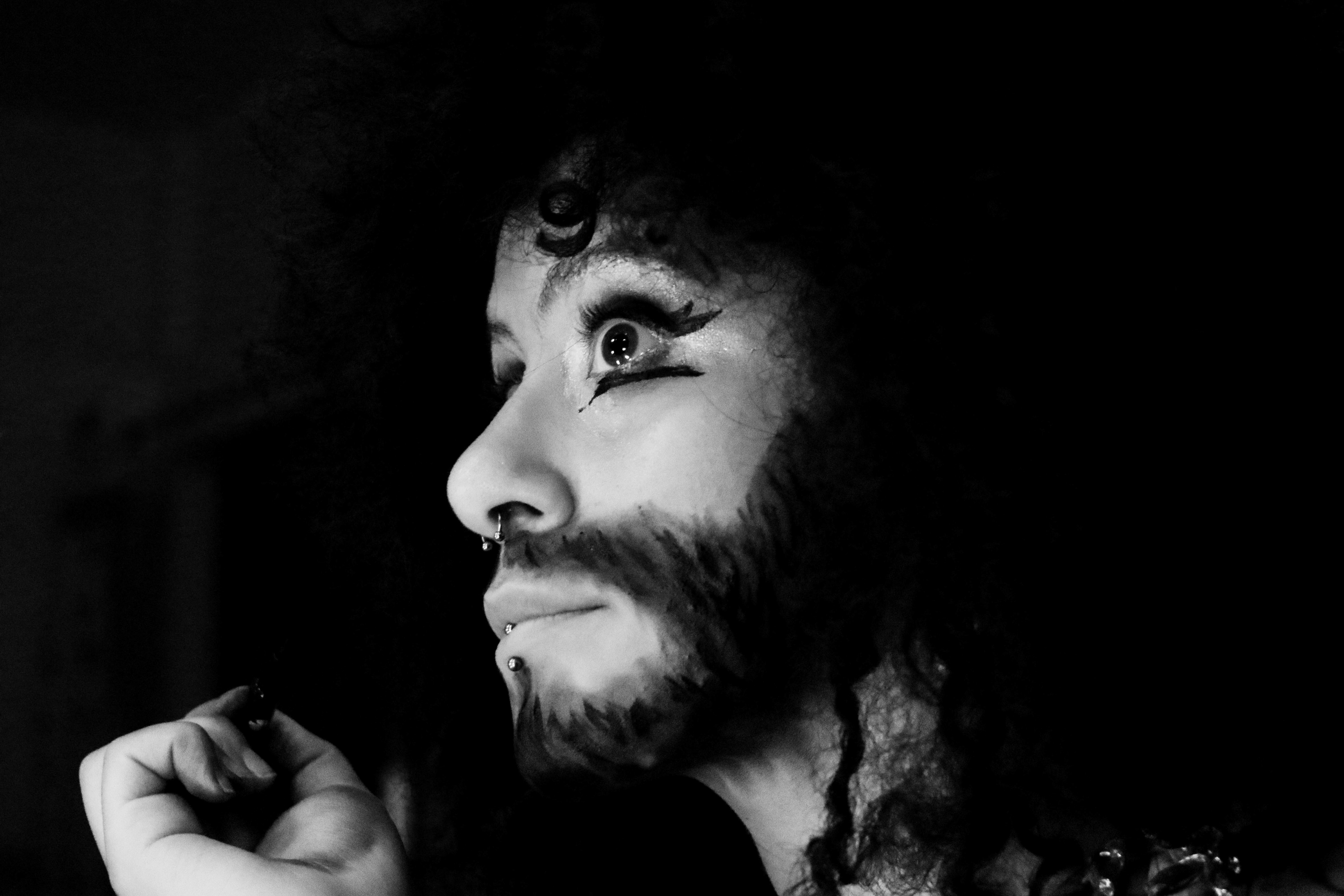 Belly dancer and drag artist Shrouk El-Attar puts on makeup before a performance