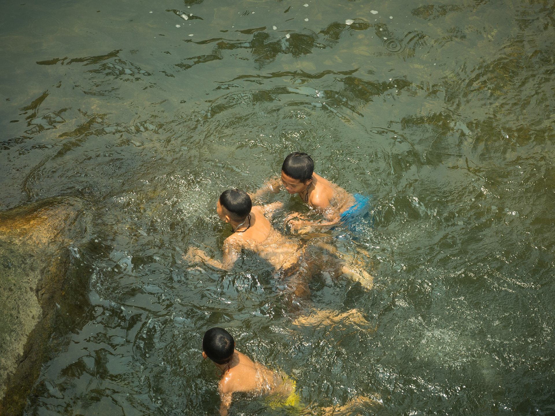 KIDS IN THE RIVER